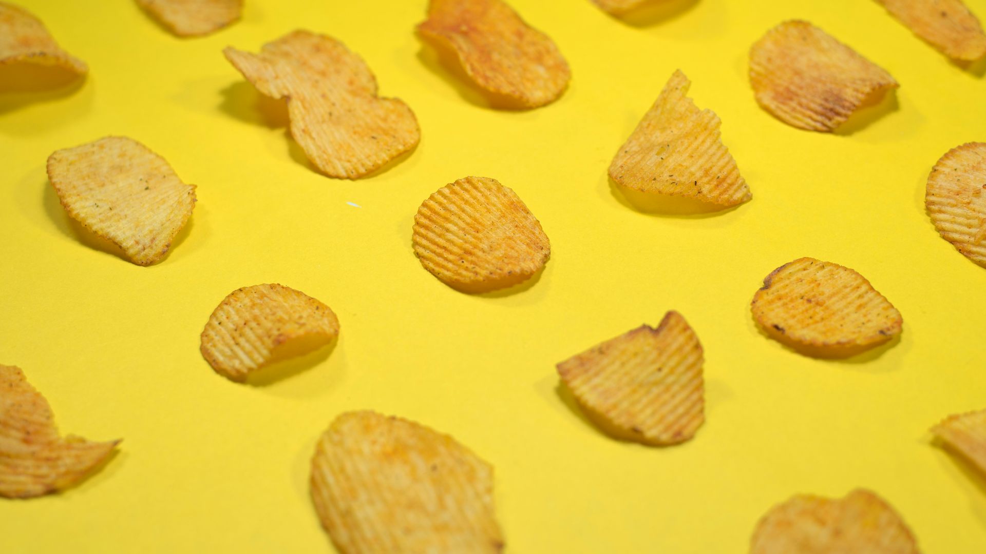 brown cookies on yellow surface