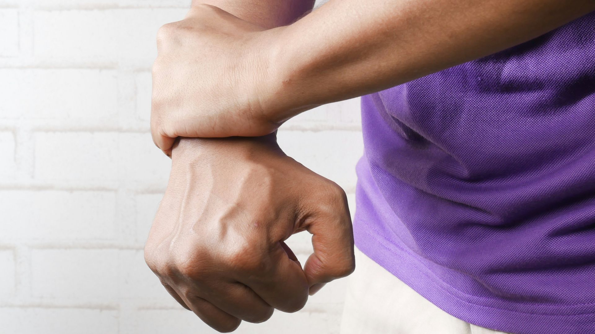 person holding hands of another person