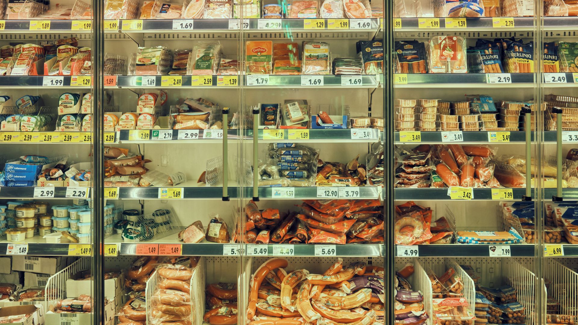 a display case filled with lots of different types of food