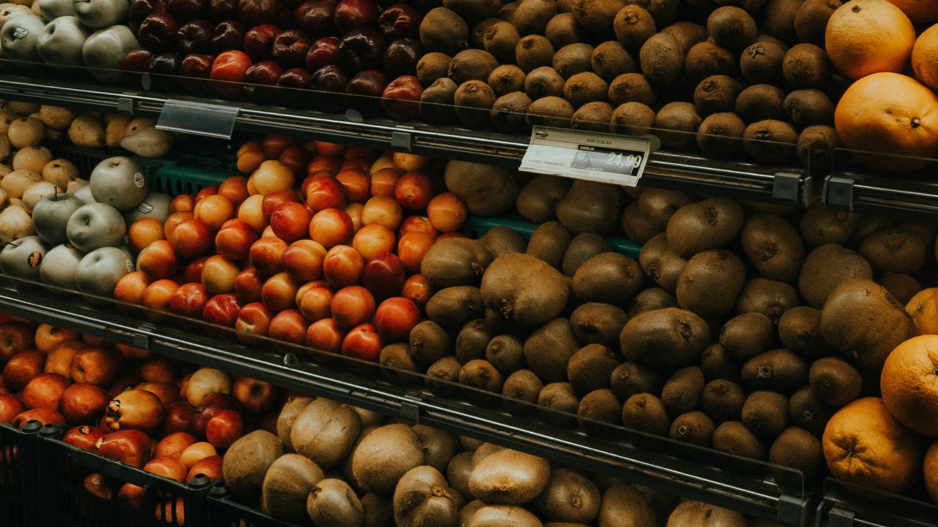 Shelves of fresh fruit in a grocery store