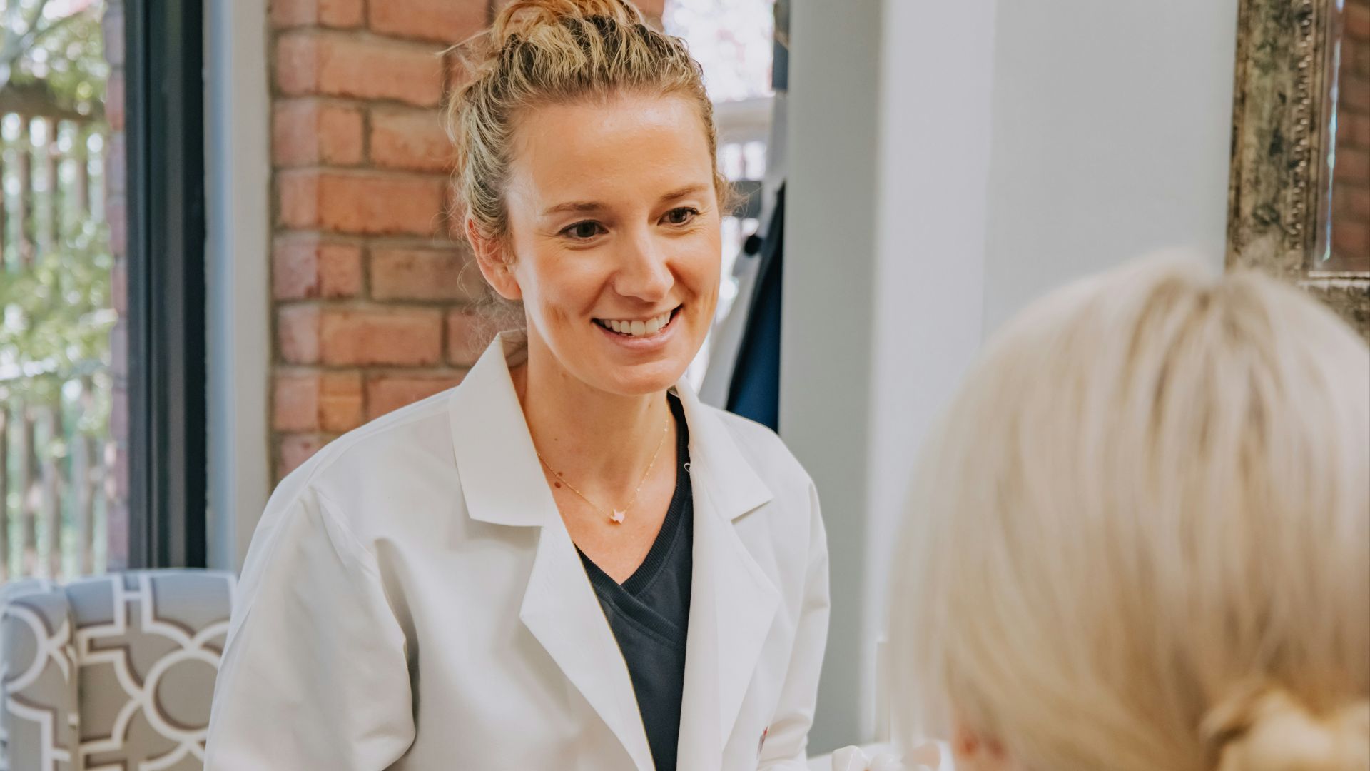 a person in a white coat