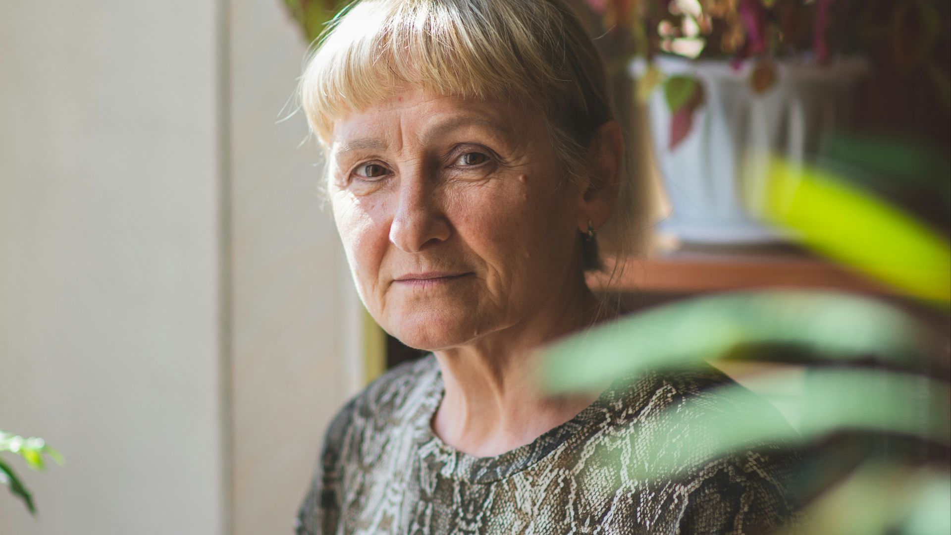 woman in gray and white crew neck shirt