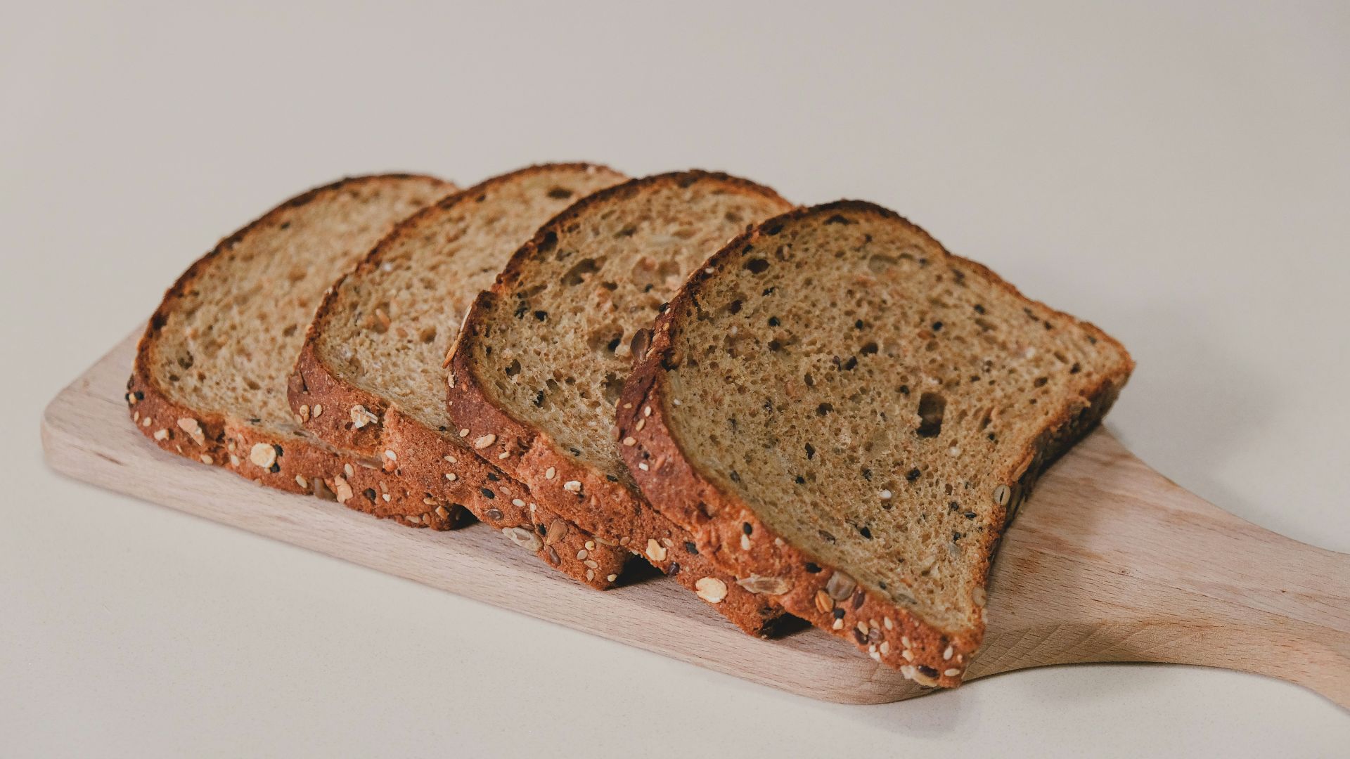 sliced bread on white table