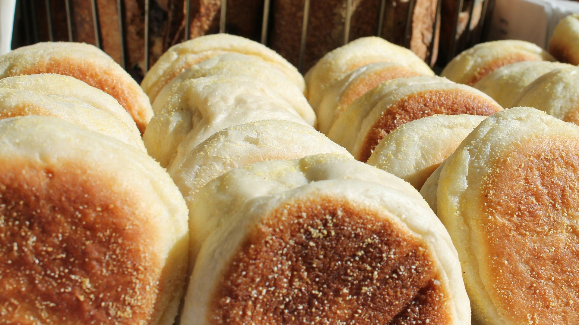 a bunch of breads that are on a table