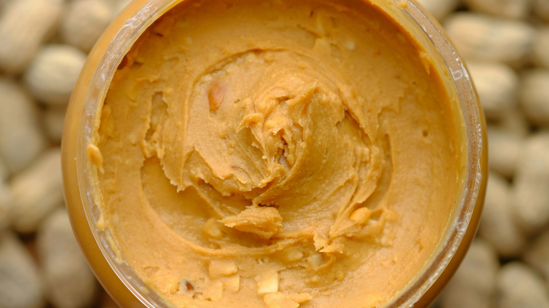 brown powder in brown round container