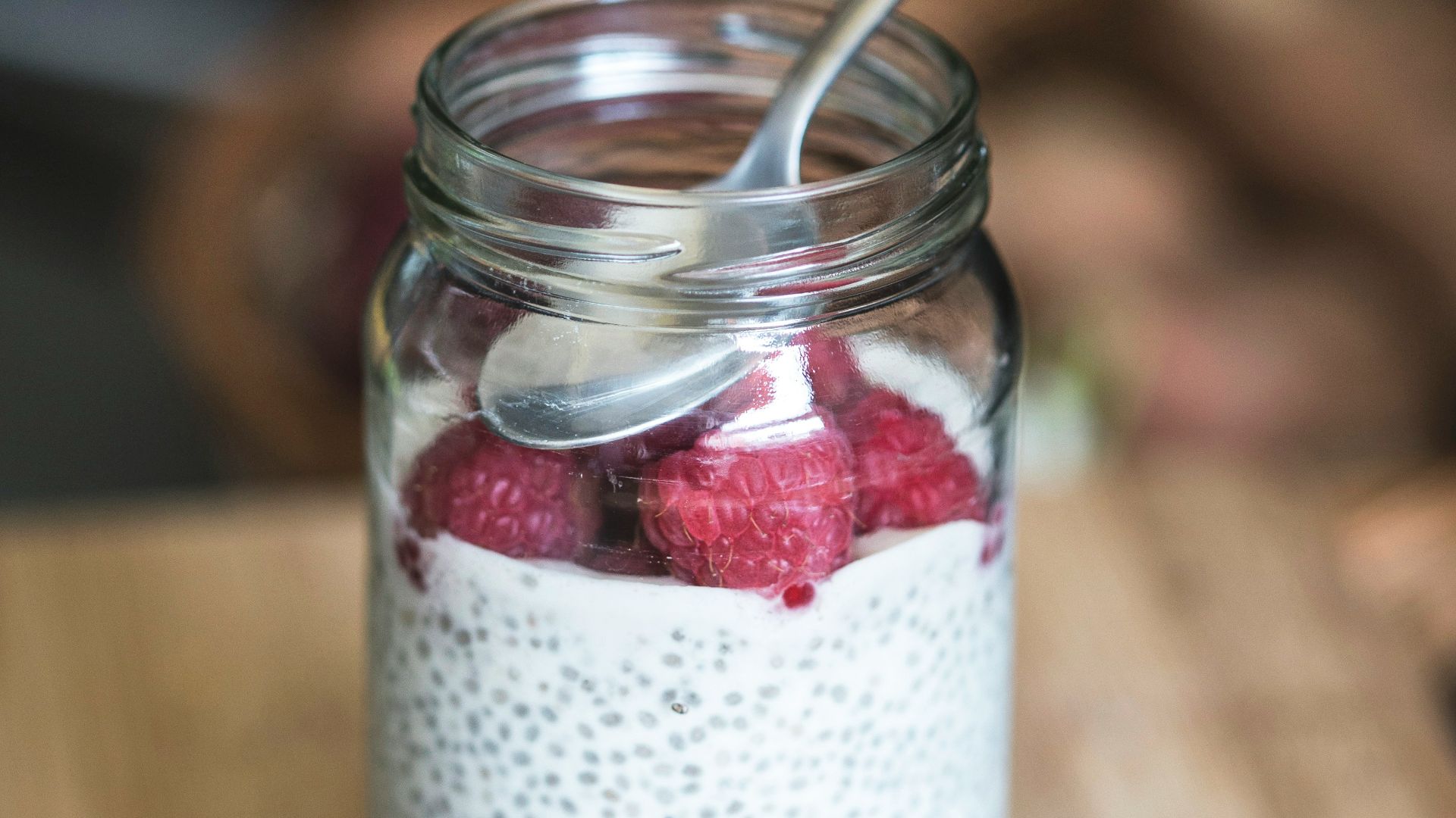 red cherries on clear glass bowl