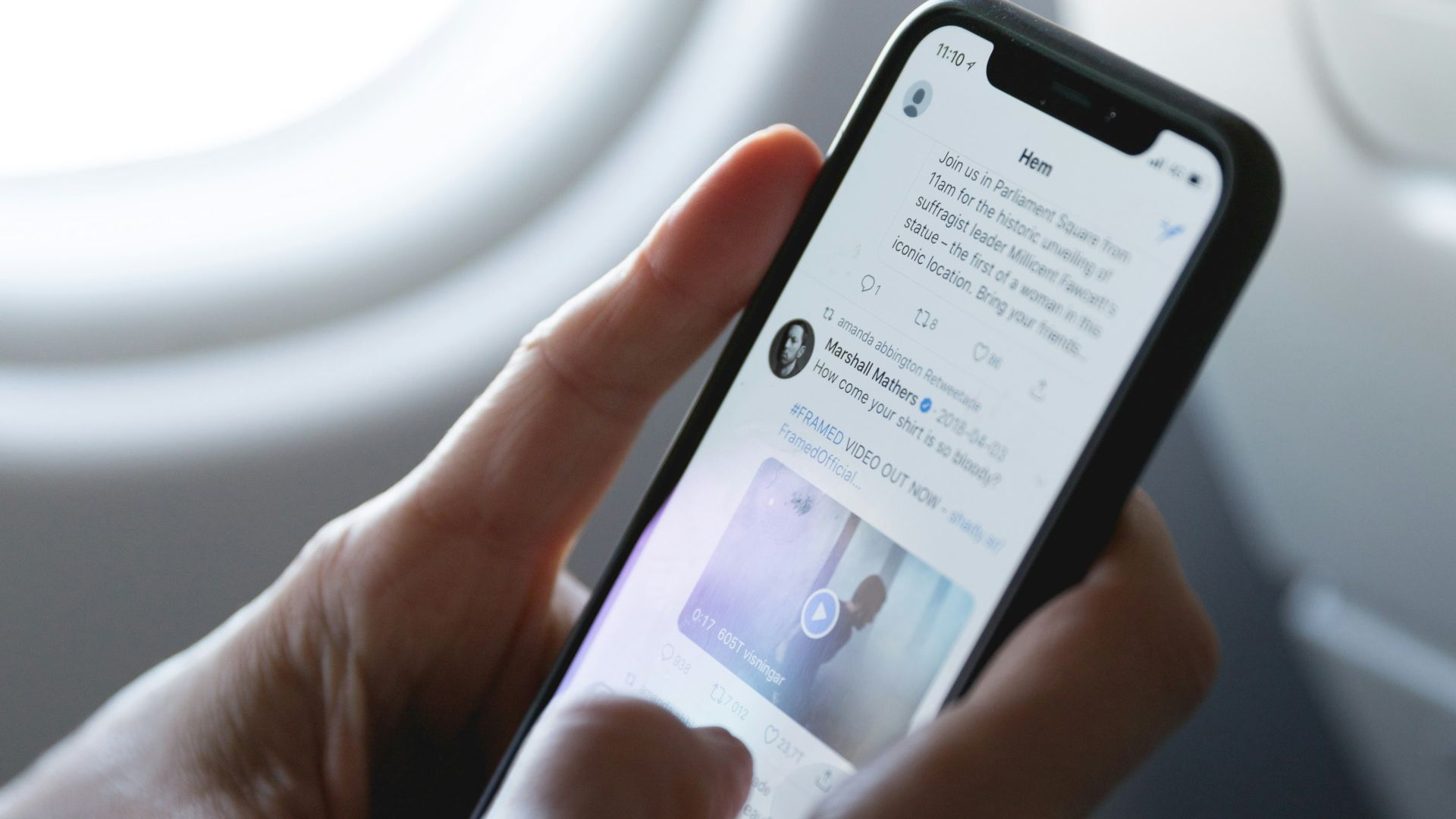 person holding space gray iPhone X