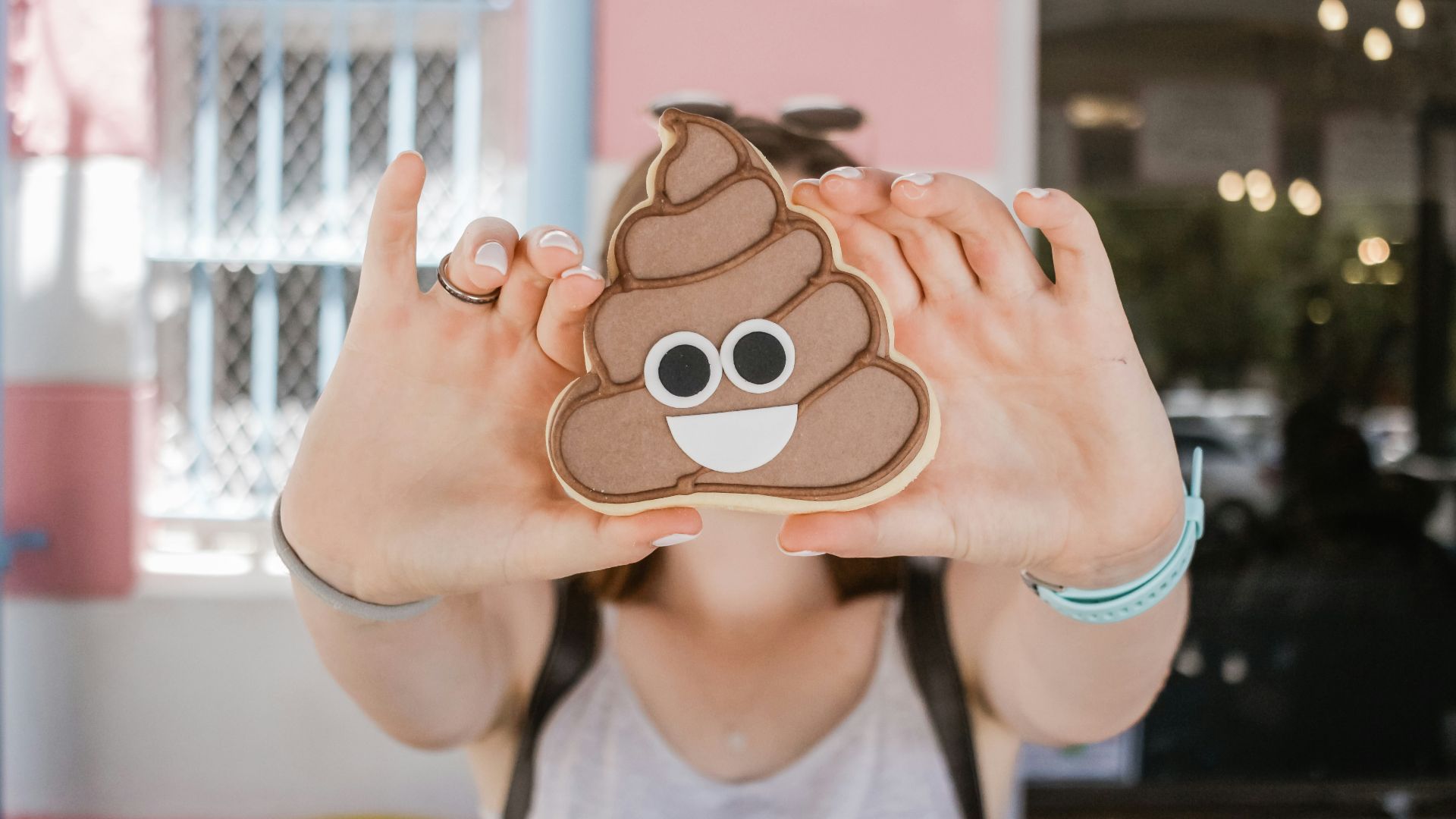 woman holding poop case