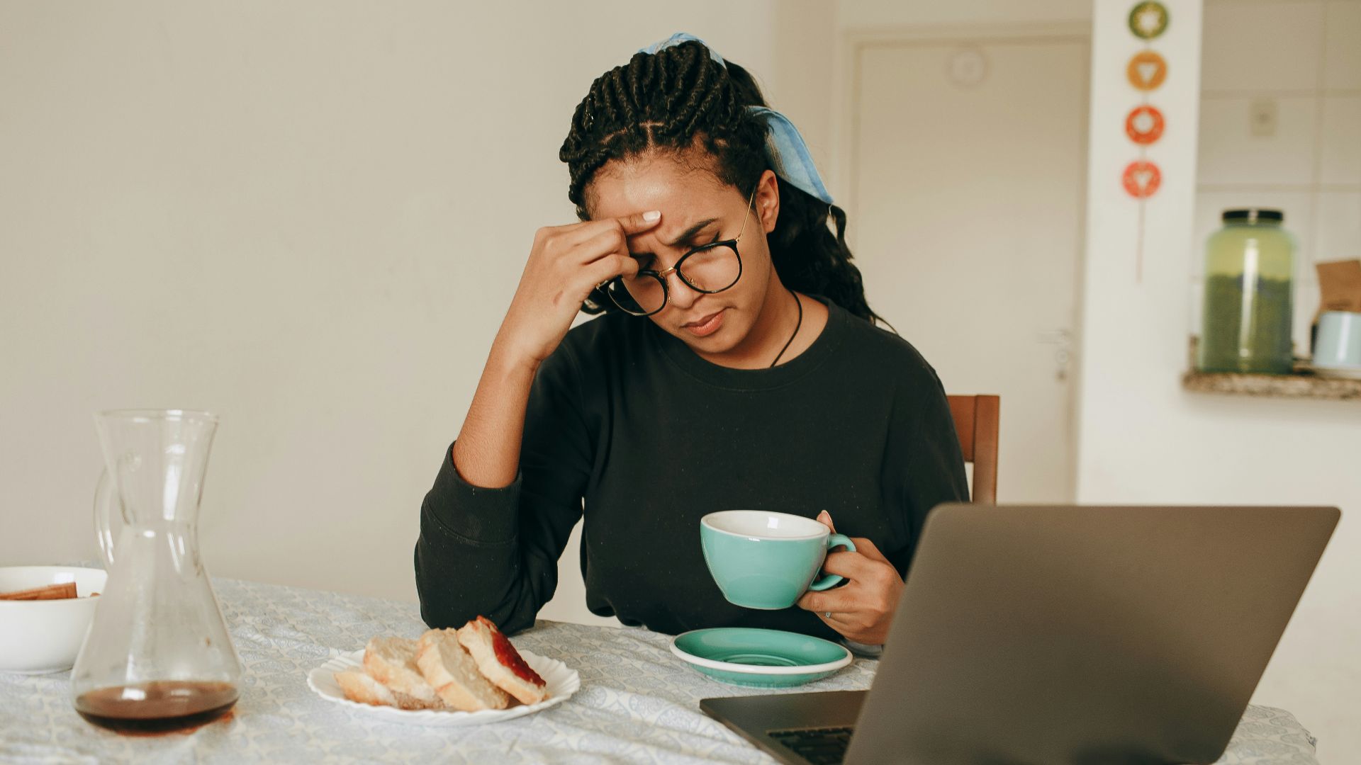 woman in black long sleeve shirt sitting on chair