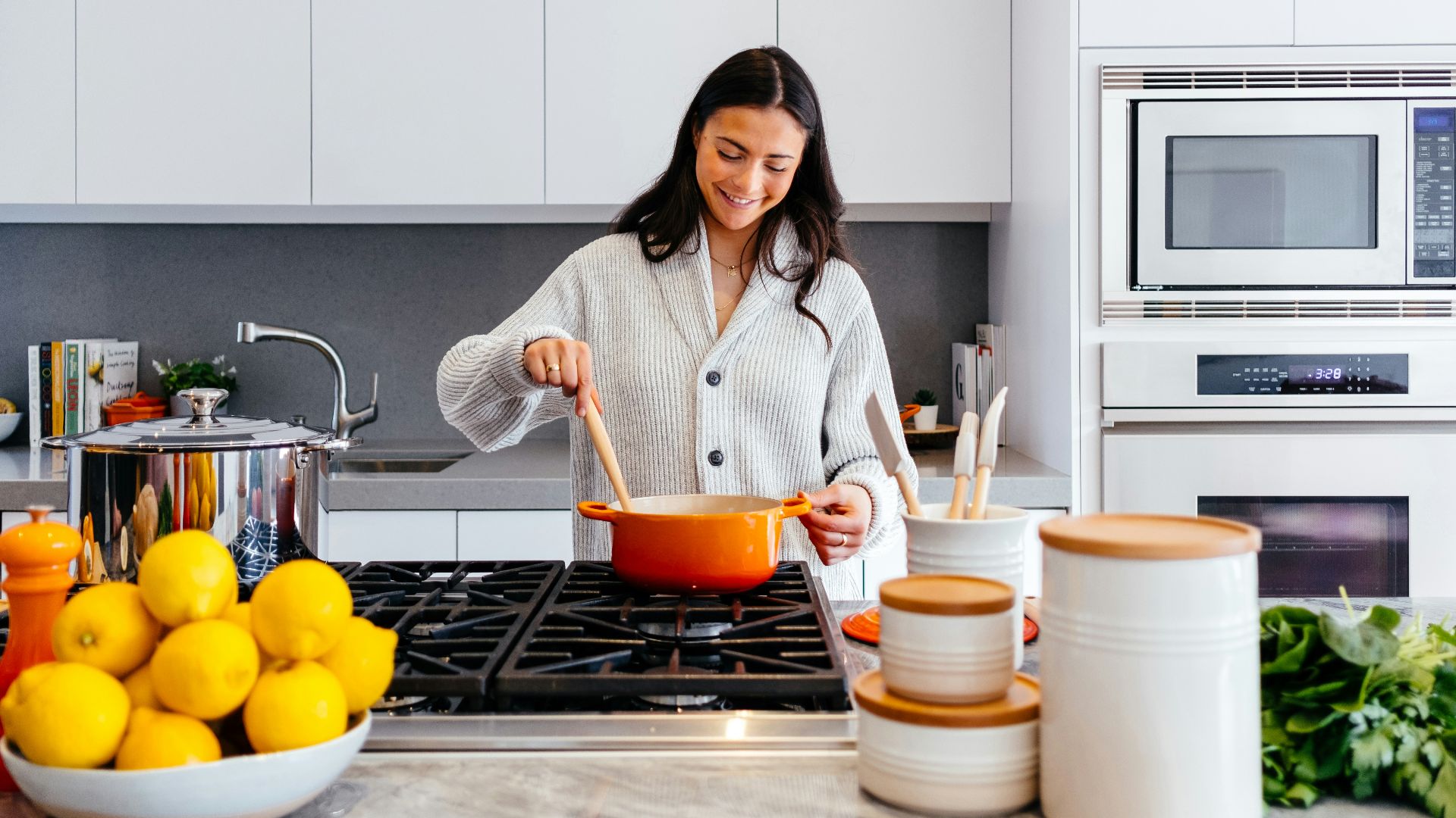 woman cooking inside kitchen room