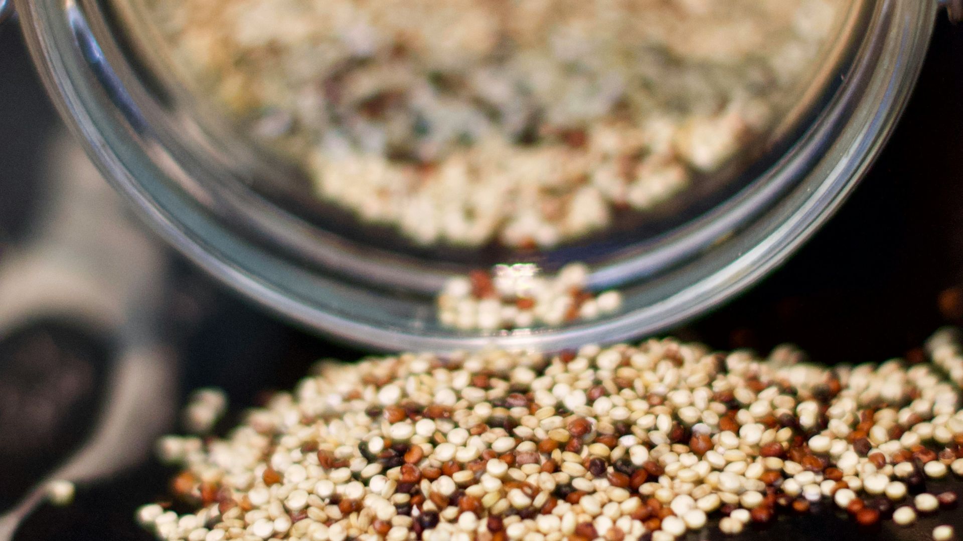 brown coffee beans in clear glass jar