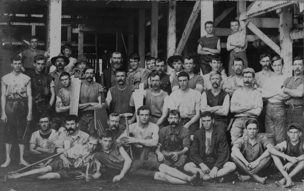 Statelibqld 1 123405 Workers From The Redbank Meatworks Lined Up At The Factory, Ca. 1900