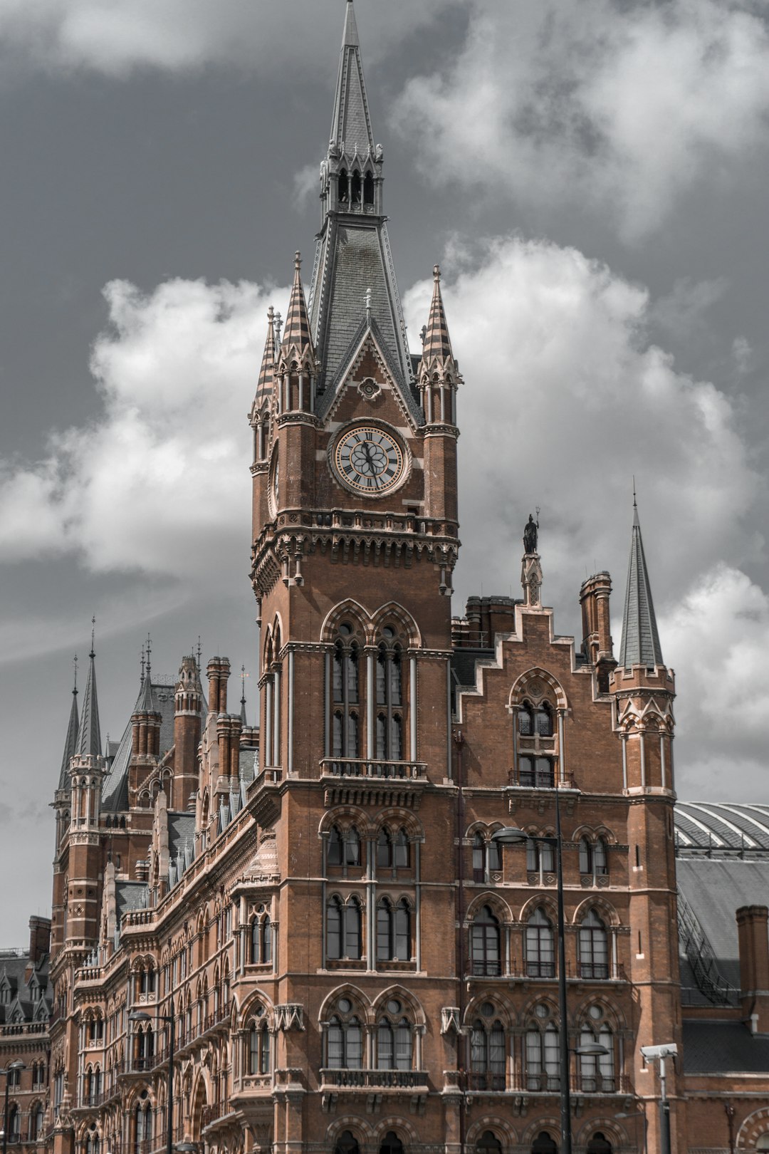 building with clock tower during day