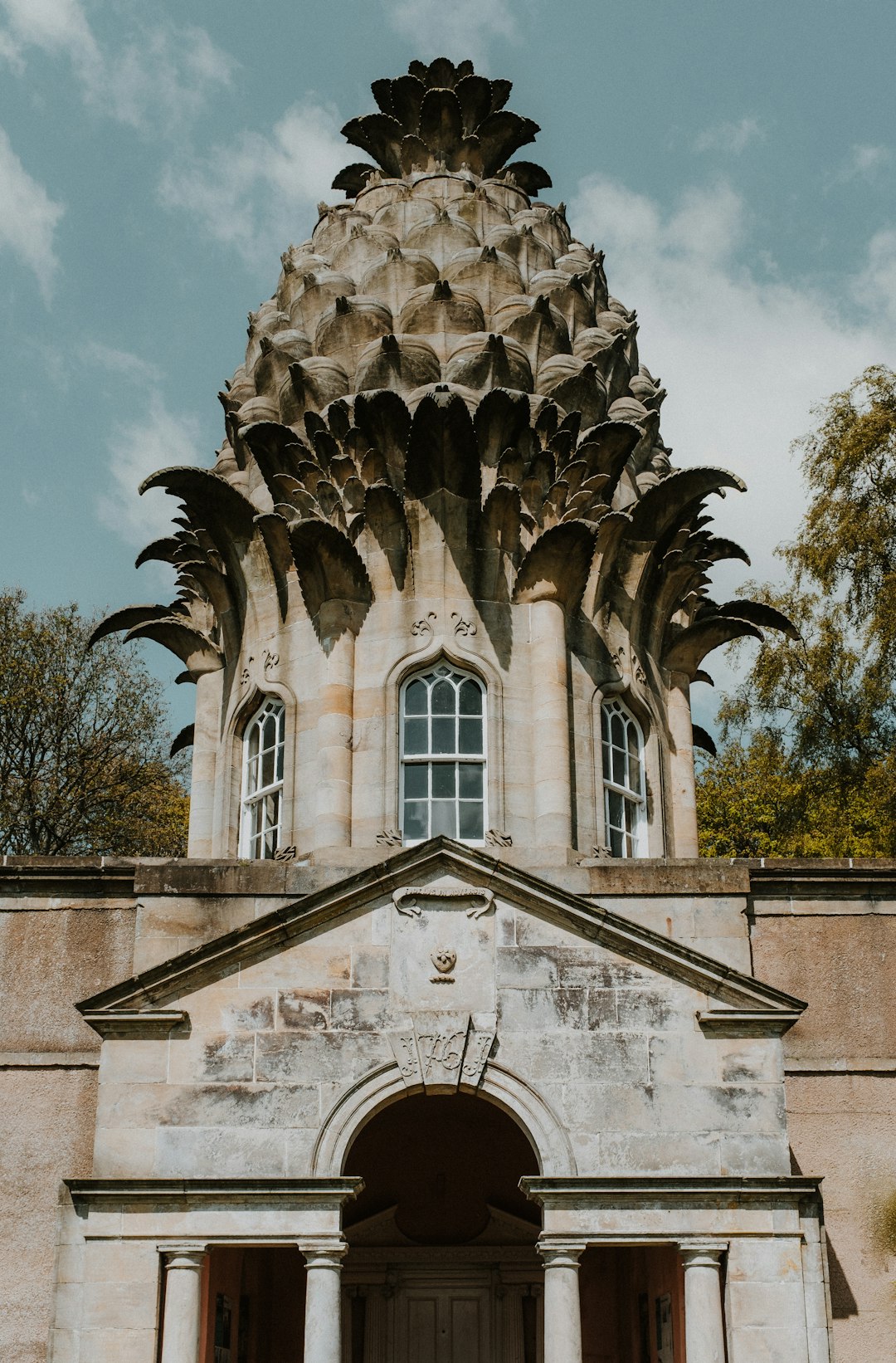 a large stone building with a large tower