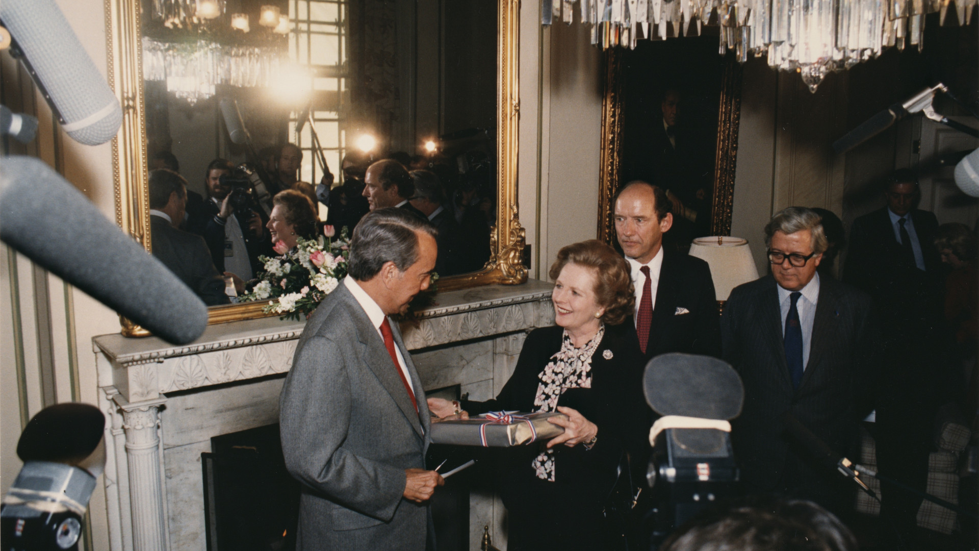 File:Senator Bob Dole presenting Margaret Thatcher with a gift.jpg