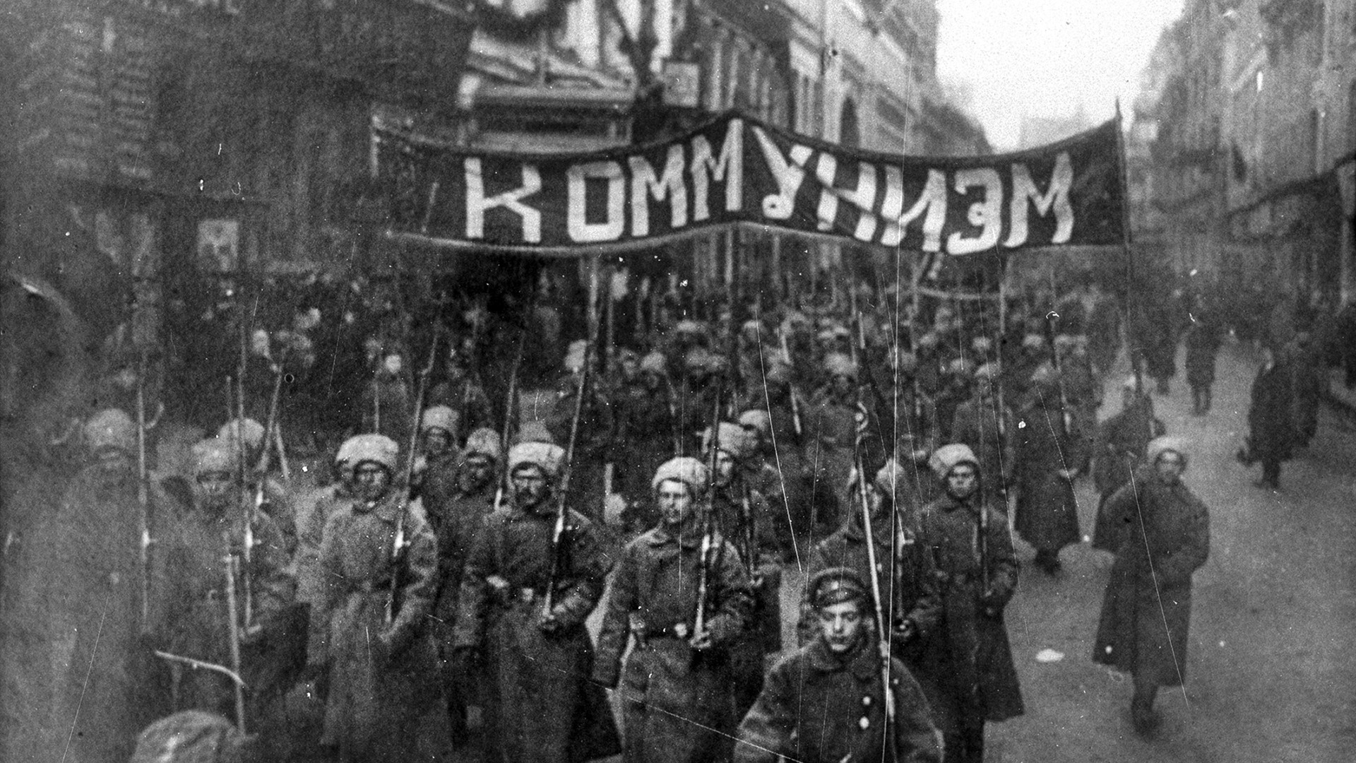File:Armed soldiers carry a banner reading 'Communism', Nikolskaya street, Moscow, October 1917.jpg