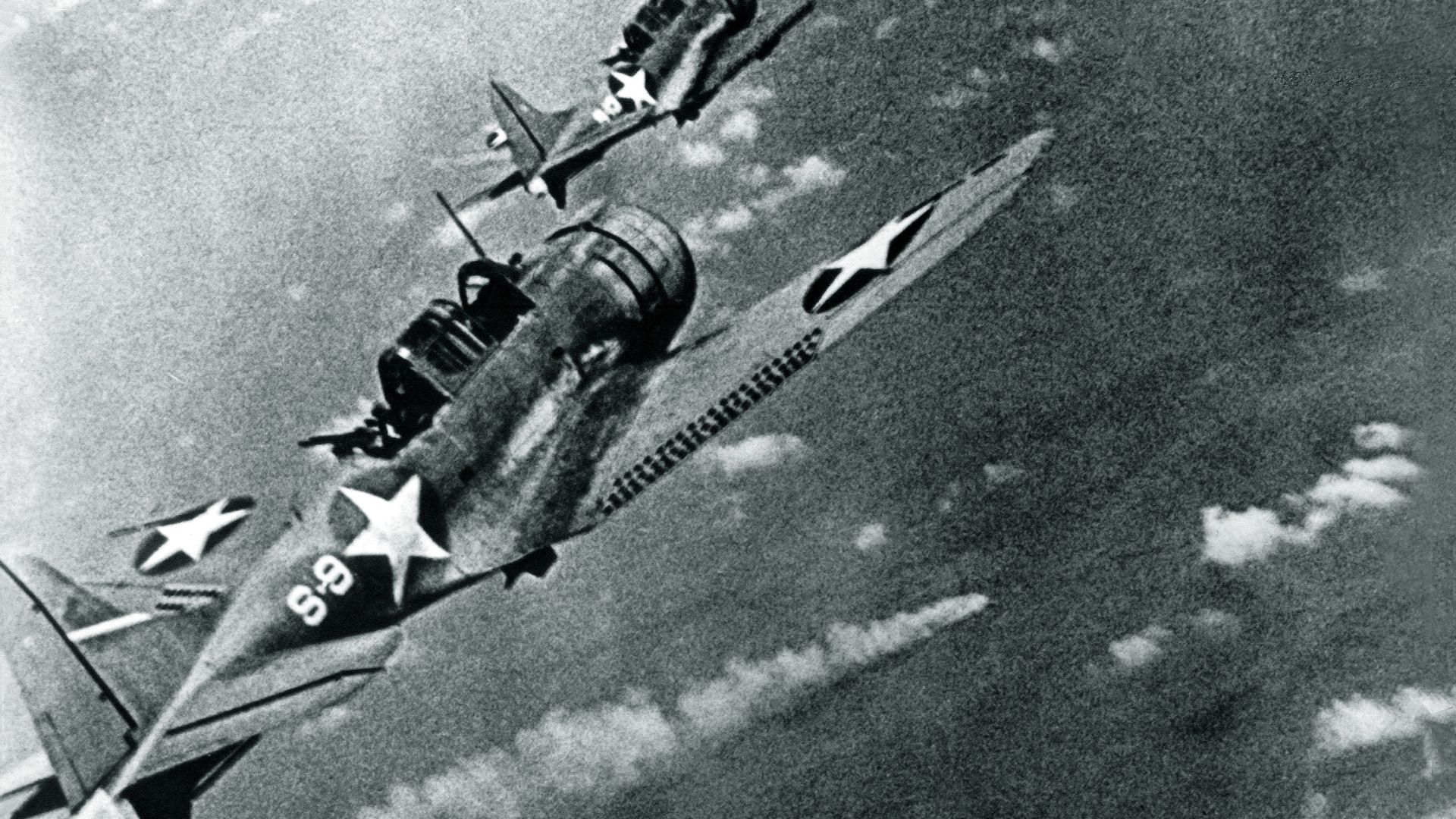 File:SBD-3 Dauntless bombers of VS-8 over the burning Japanese cruiser Mikuma on 6 June 1942.jpg