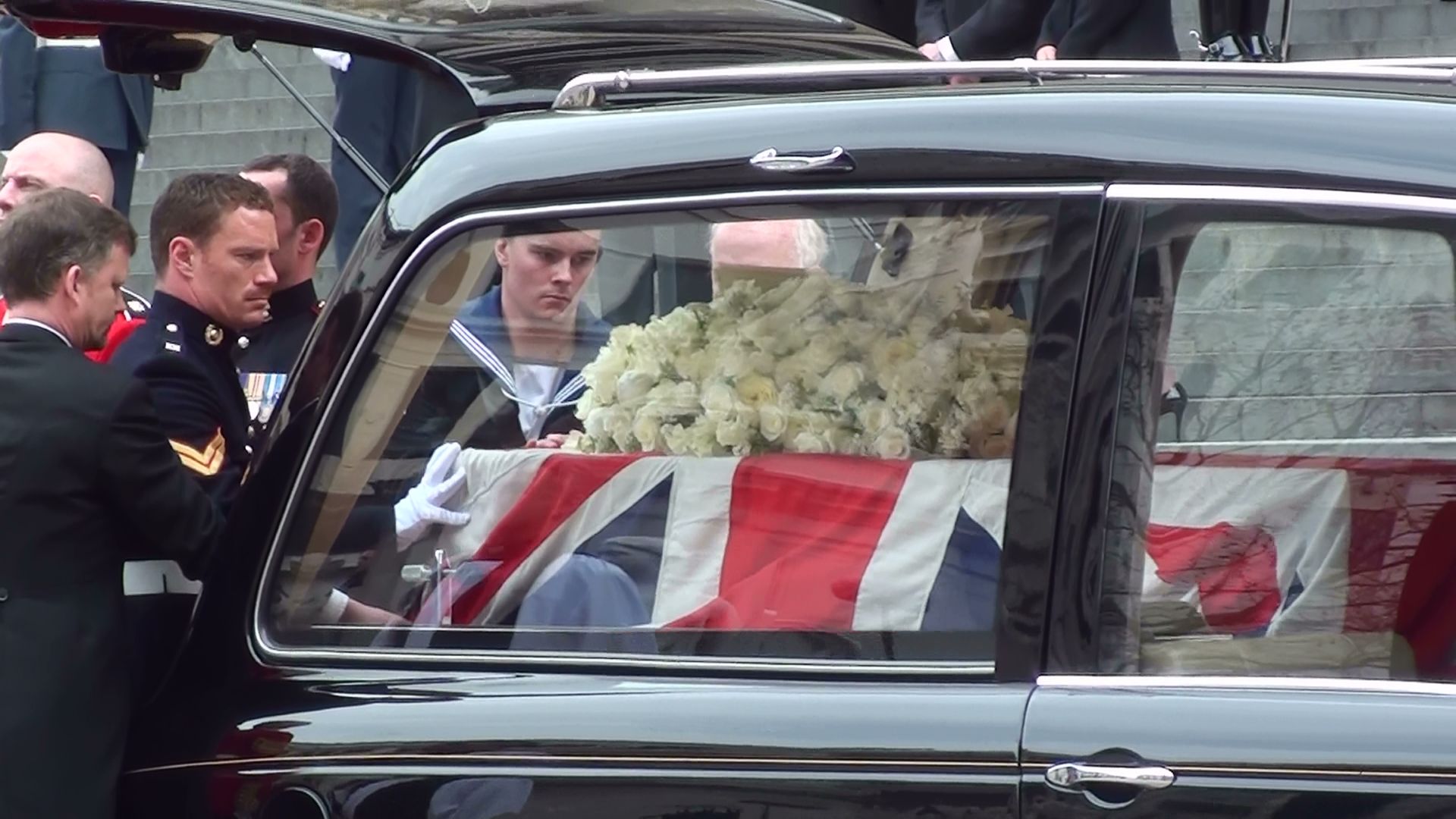 File:Thatcher funeral, coffin loaded in hearse.jpg