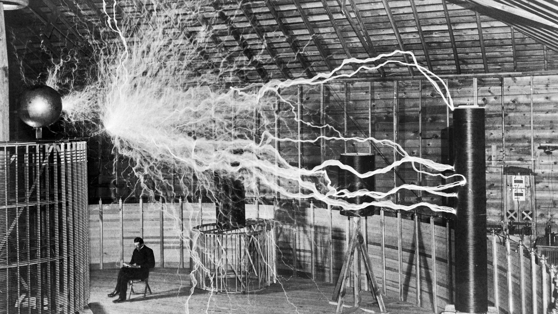File:Nikola Tesla, with his equipment EDIT.jpg