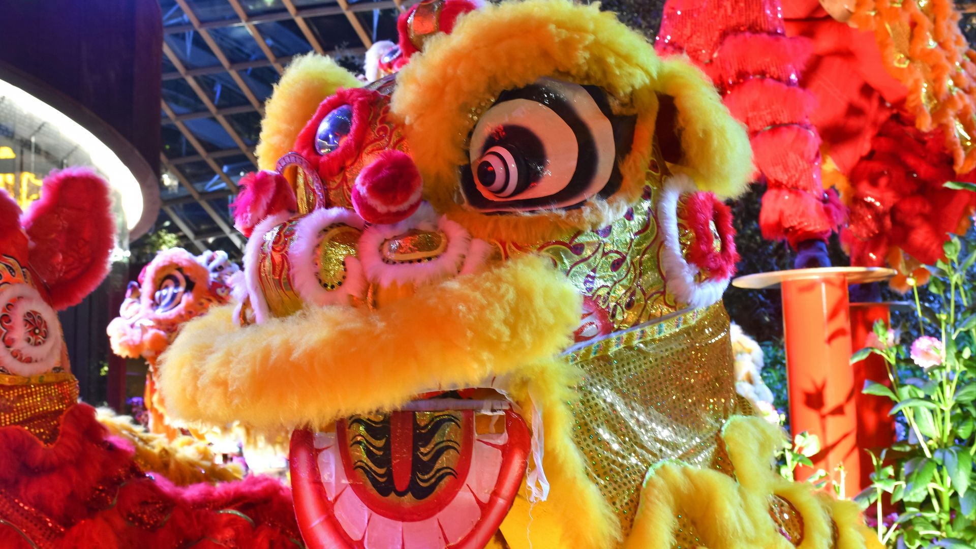 yellow and red plush toy