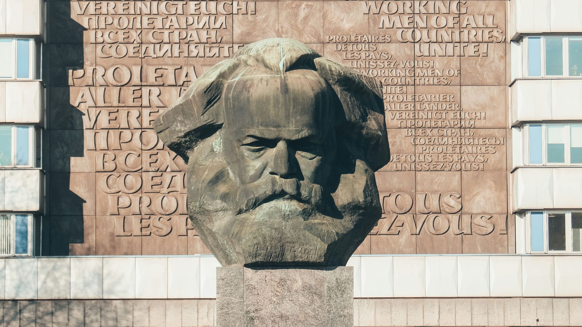 mans face concrete statue