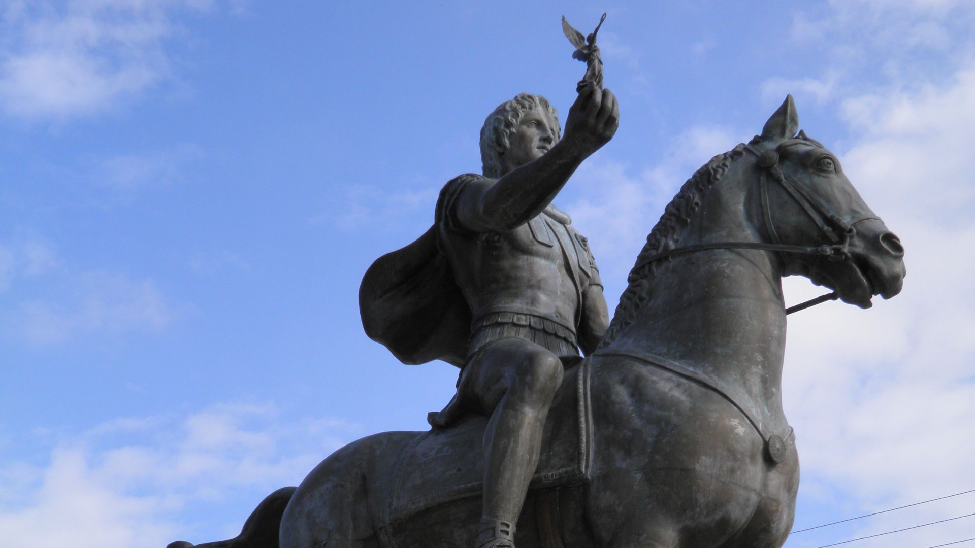 File:Statue of Alexander the Great riding Bucephalus and carrying a winged statue of Nike (square of Alexander the Great) in Pella city (6914818348).jpg