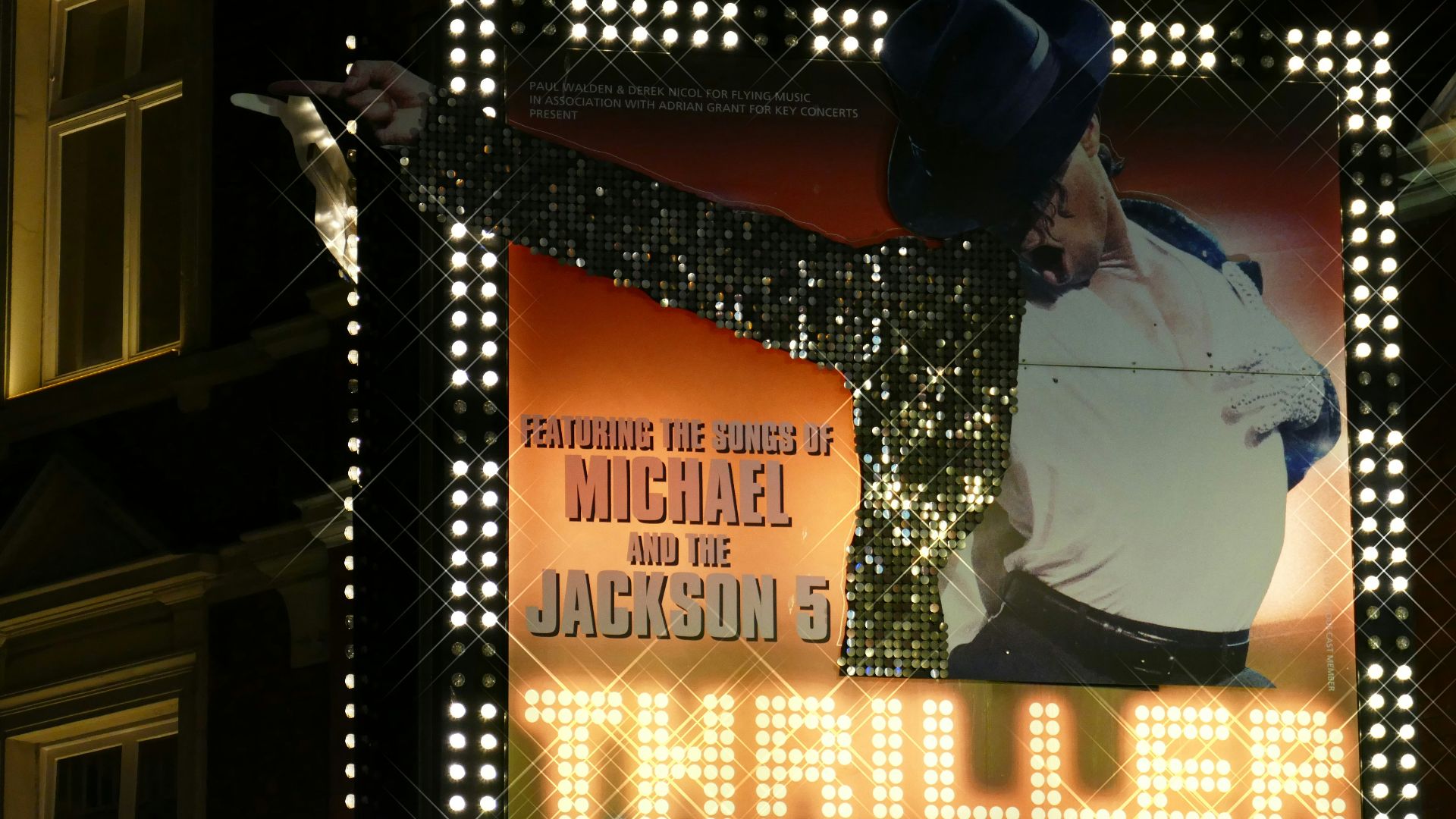 Michael Jackson 5 billboard during nighttime