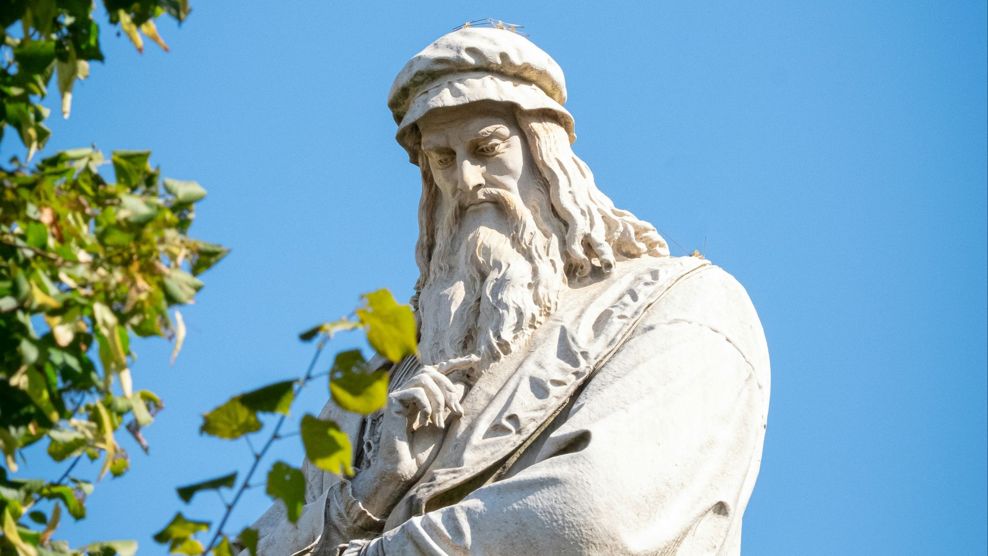 A statue of a man with a long beard