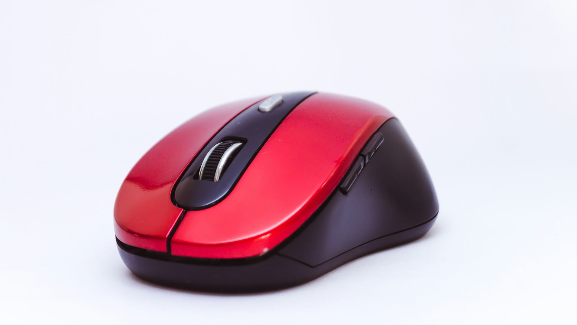 black and red cordless computer mouse