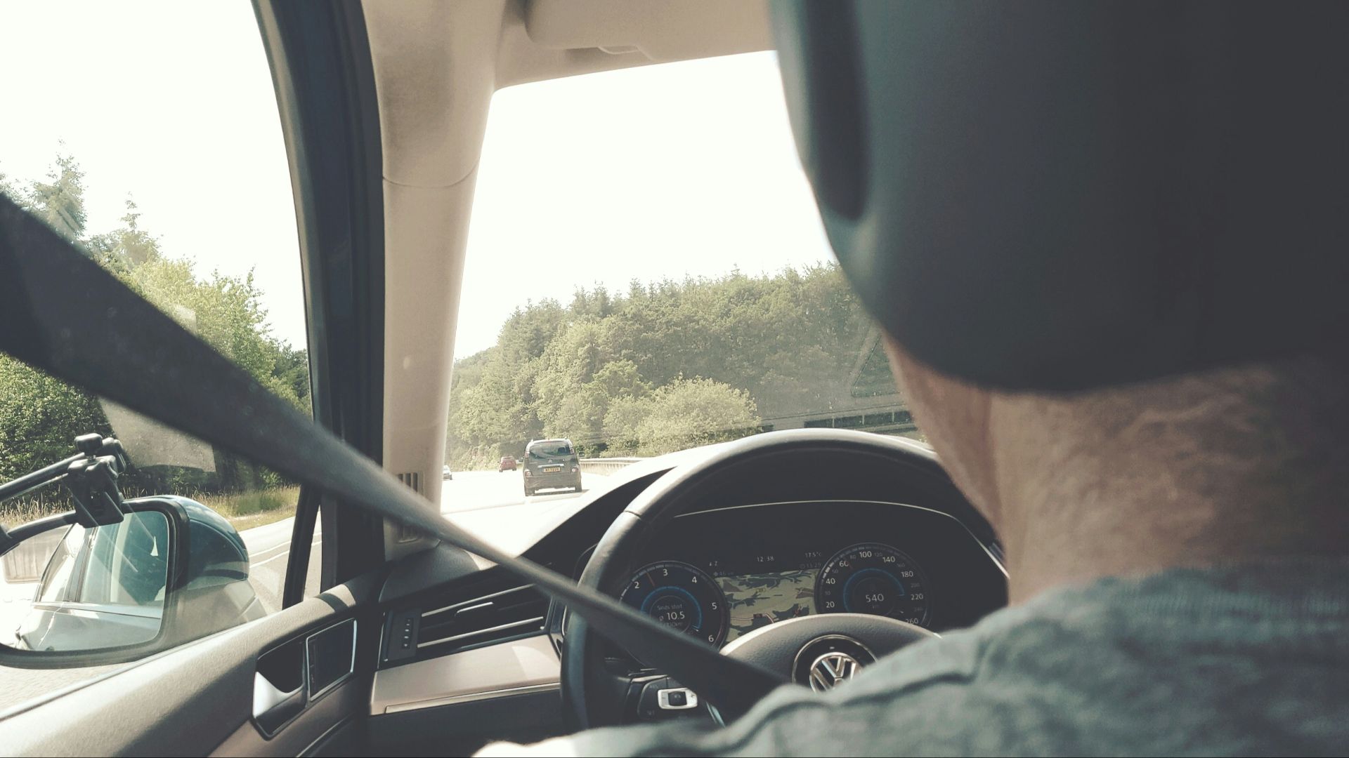 person riding vehicle during daytime