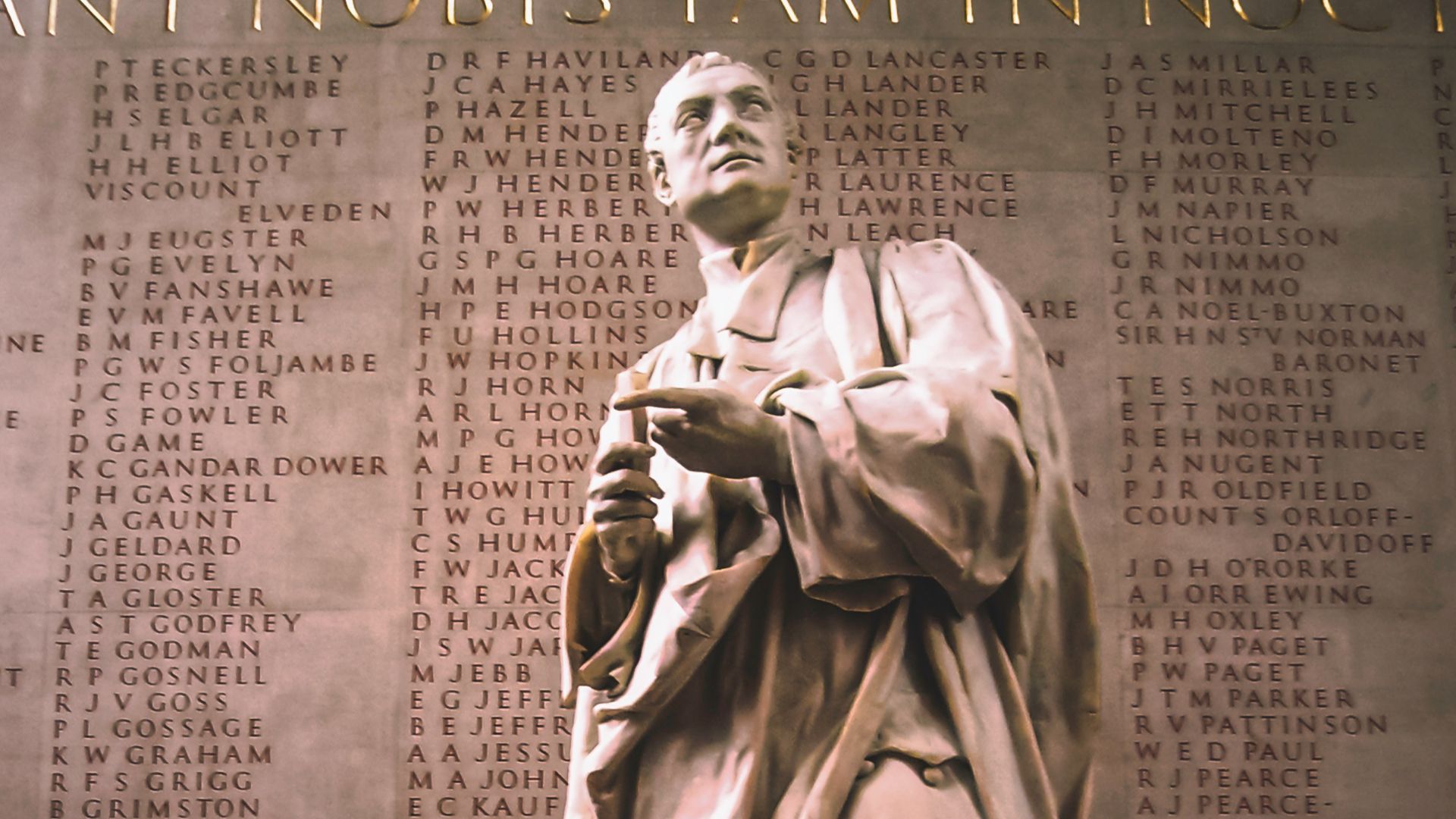 gray concrete statue of man