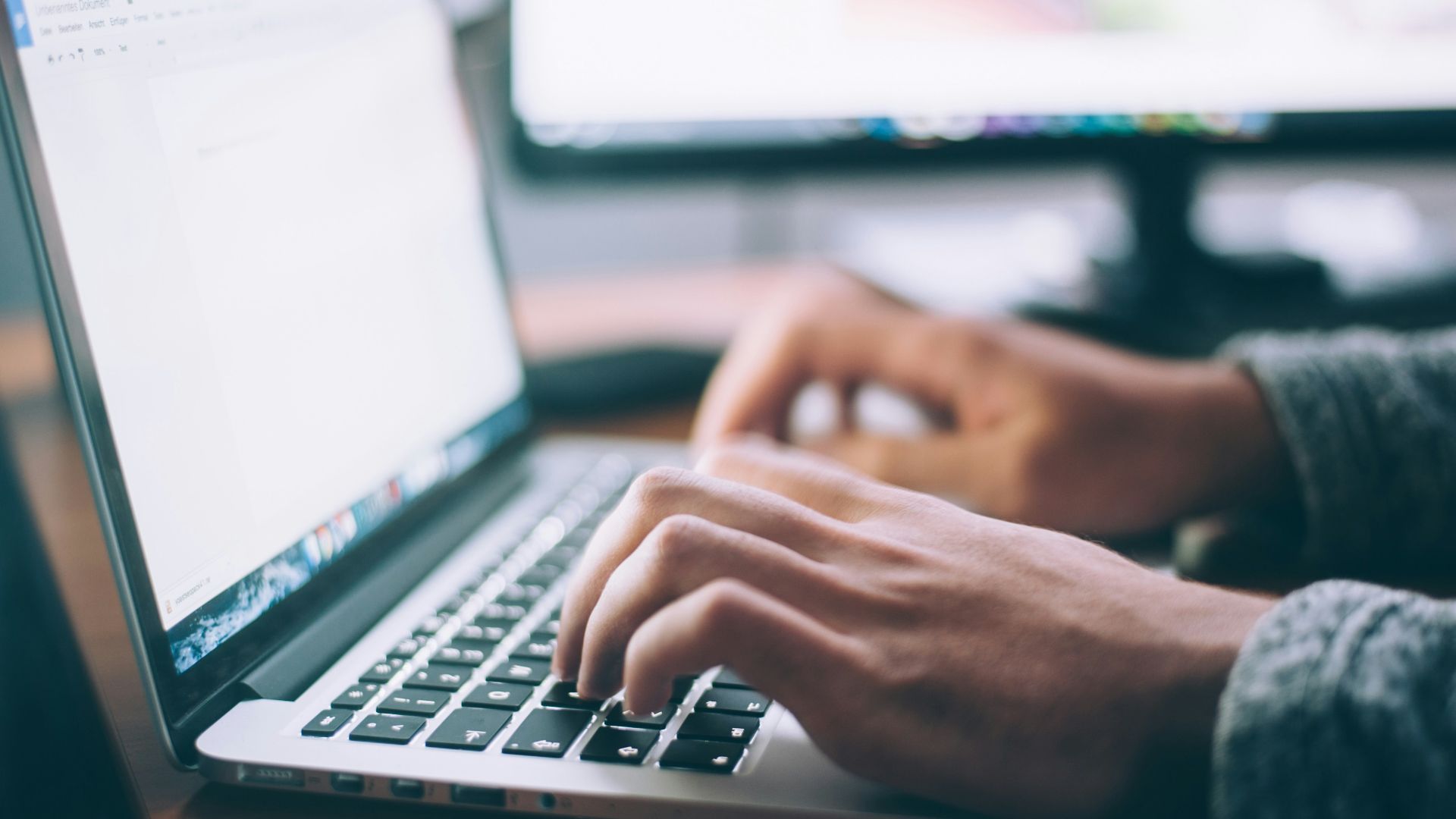 person using MacBook Pro