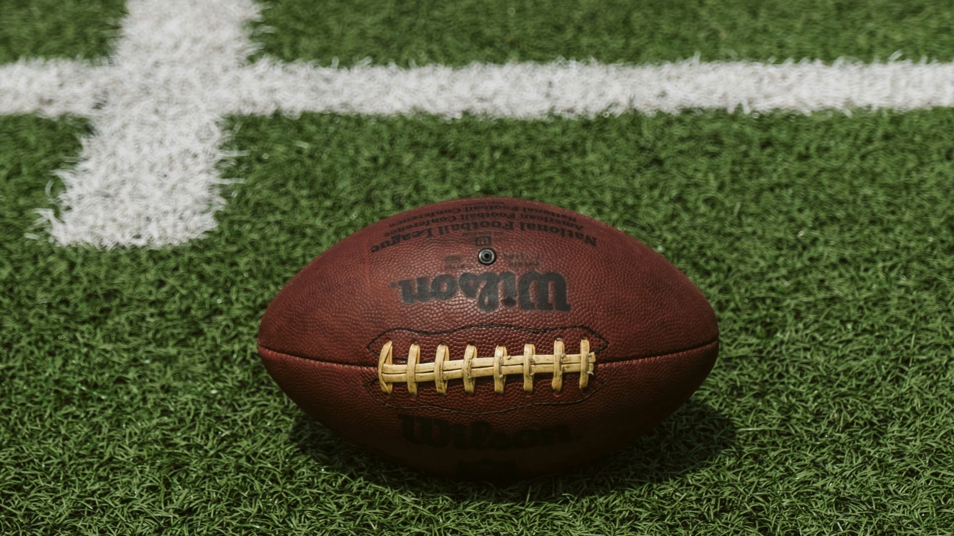 brown Wilson football on field