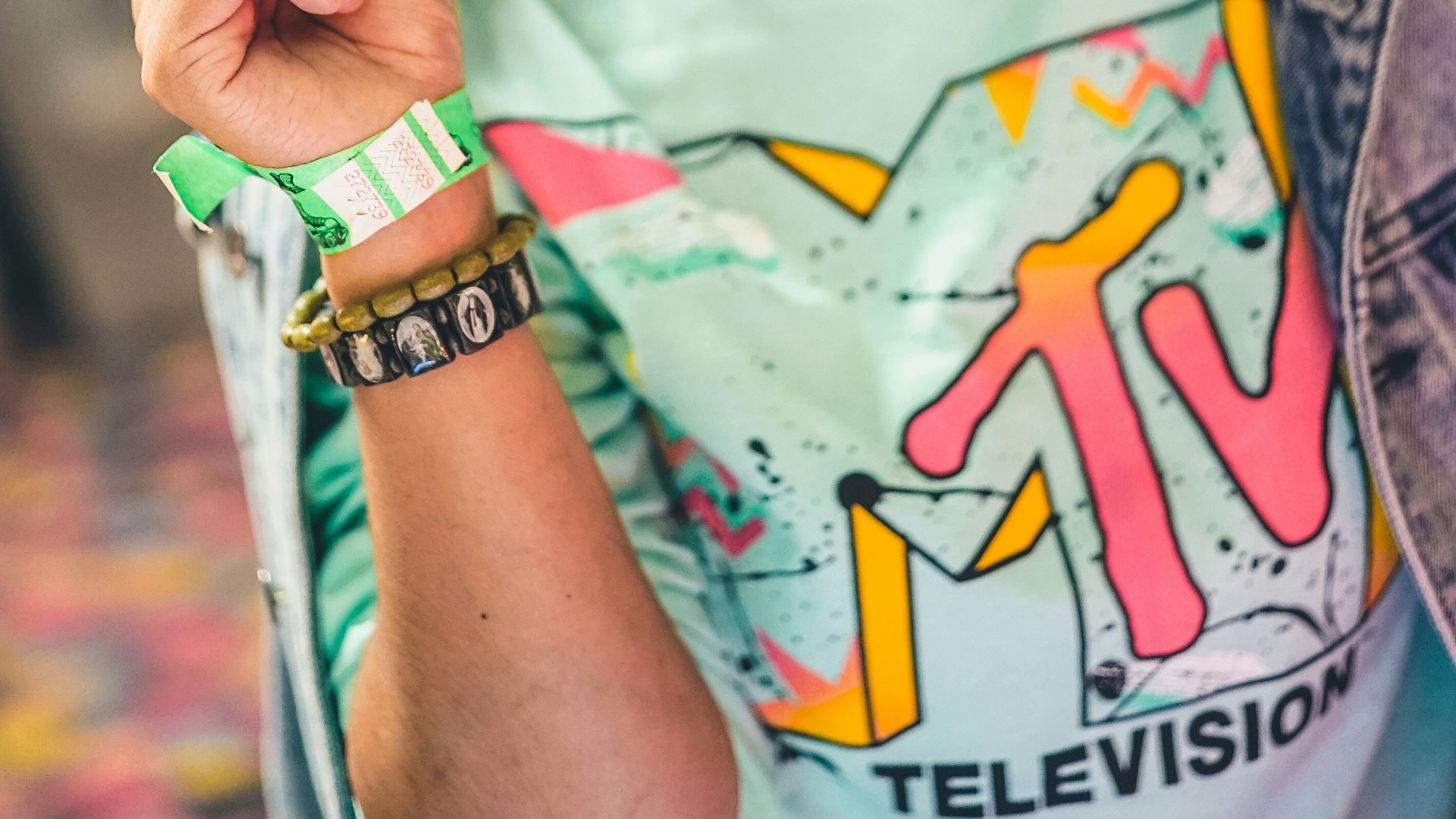 selective focus photography of woman holding eyeglasses