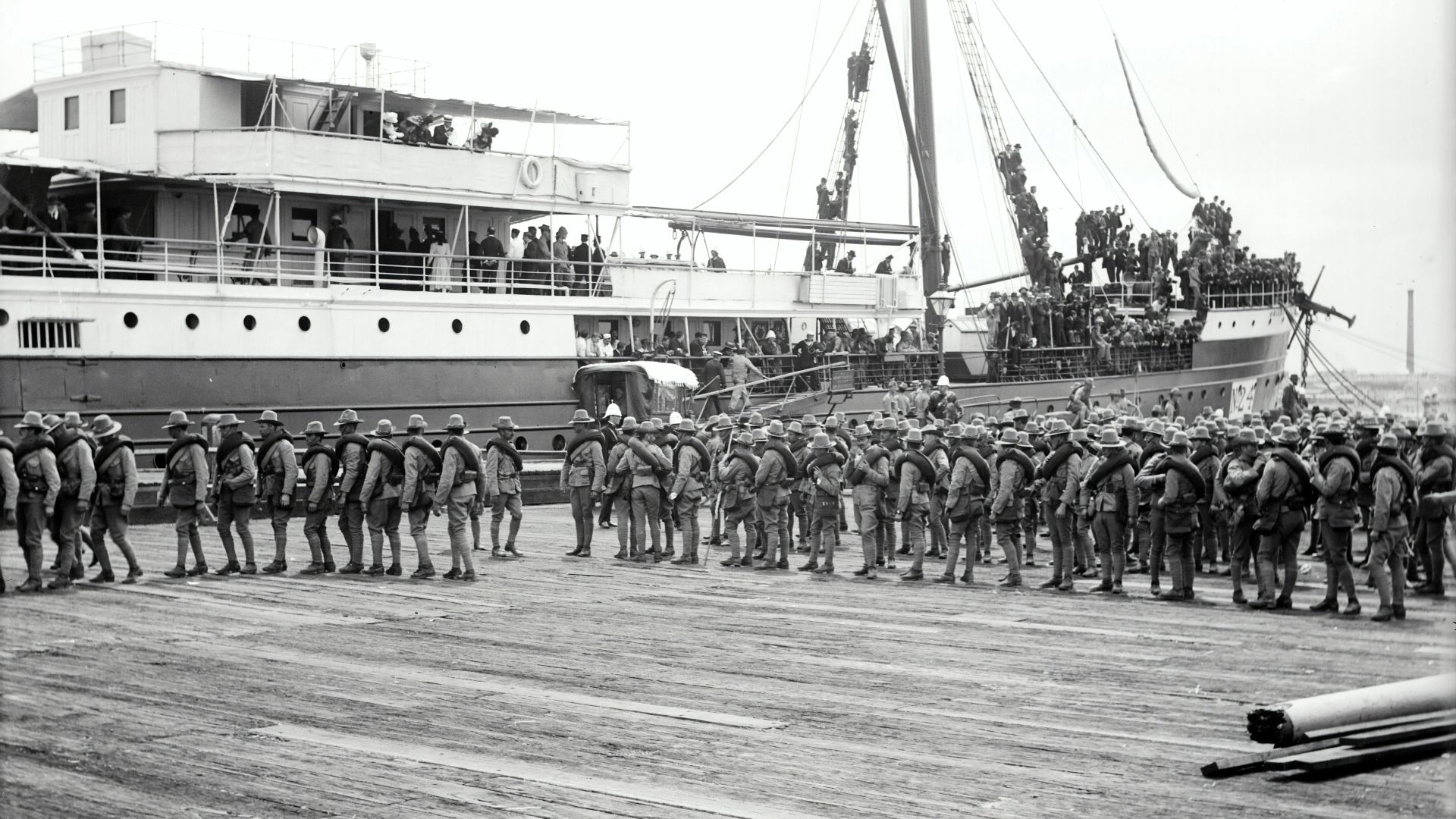 group of boy's standing near on ship