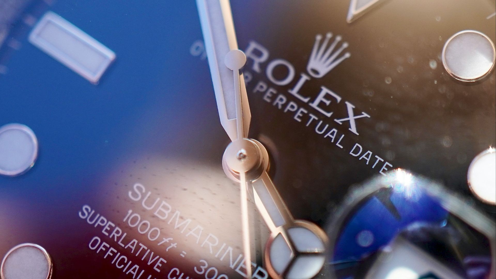 blue and silver round analog watch