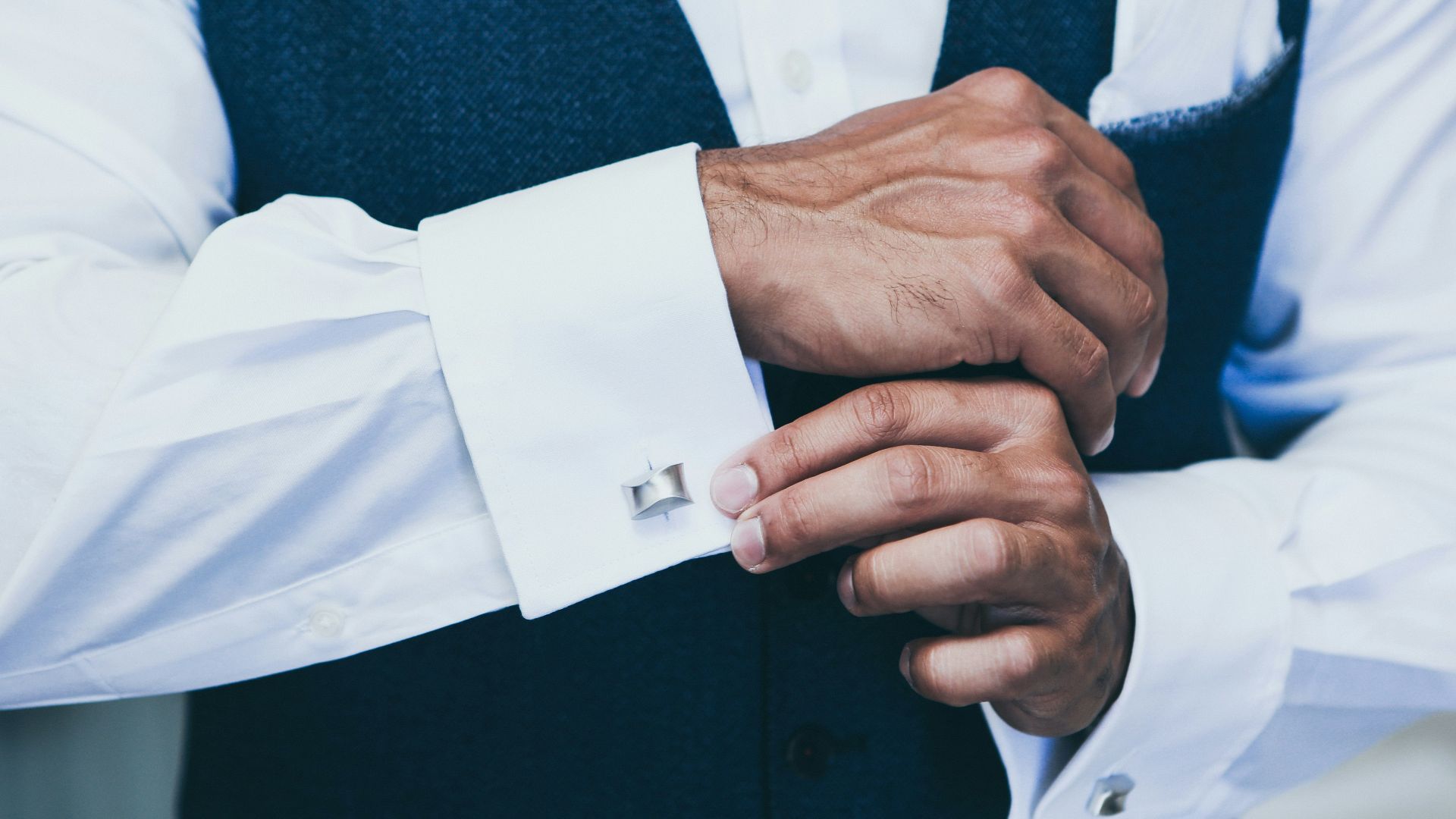 person wearing white dress shirt