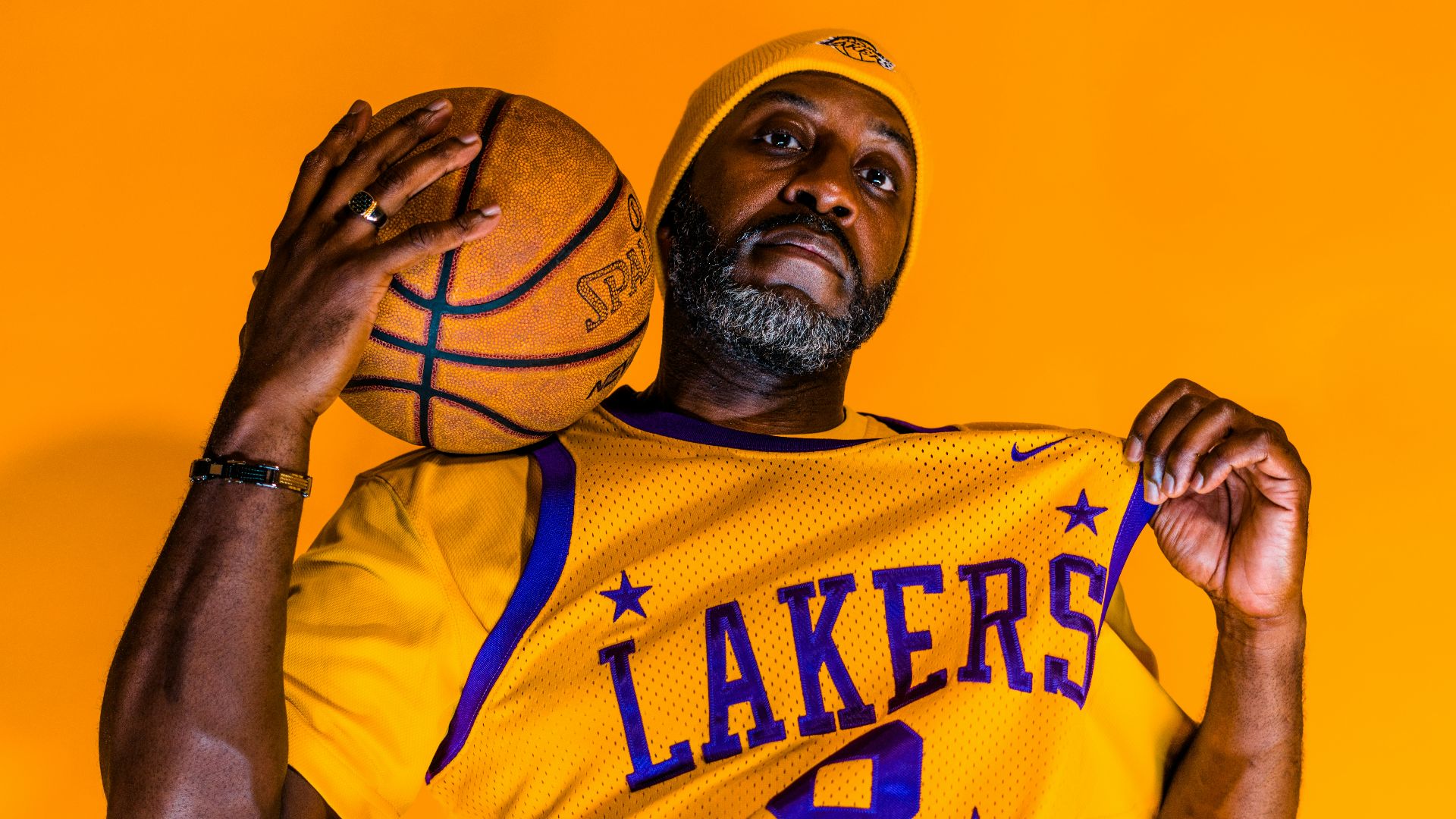 person wearing a Los Angeles Lakers jersey