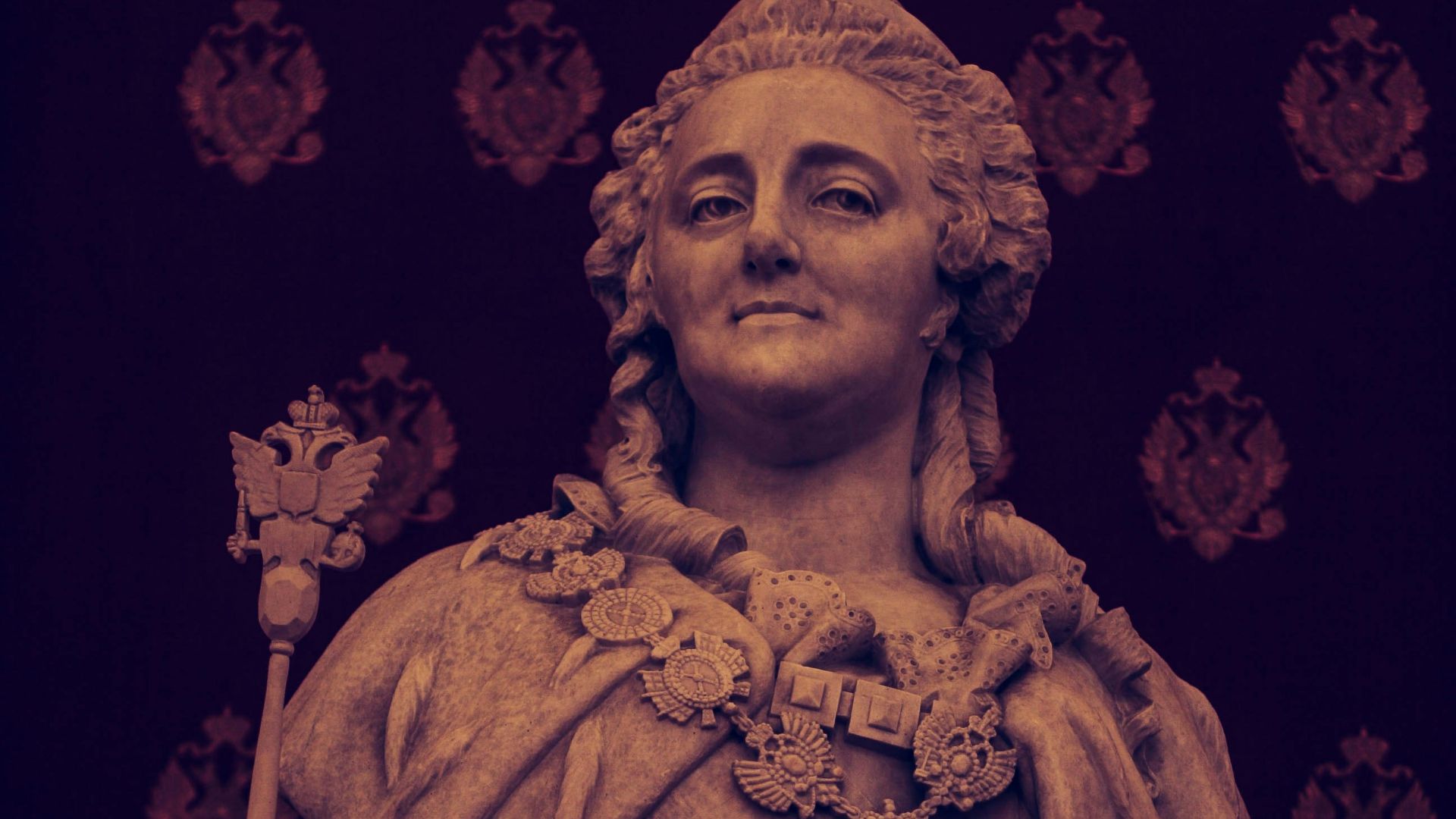 a statue of a woman holding a cane