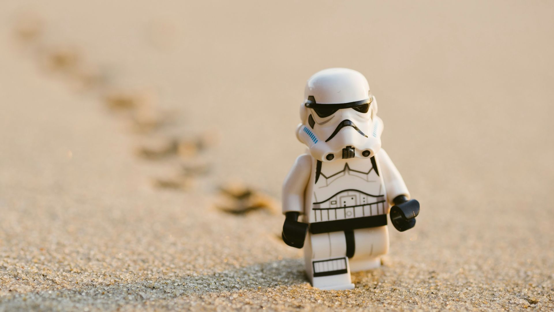 Stormtrooper minifigure walking on the sand