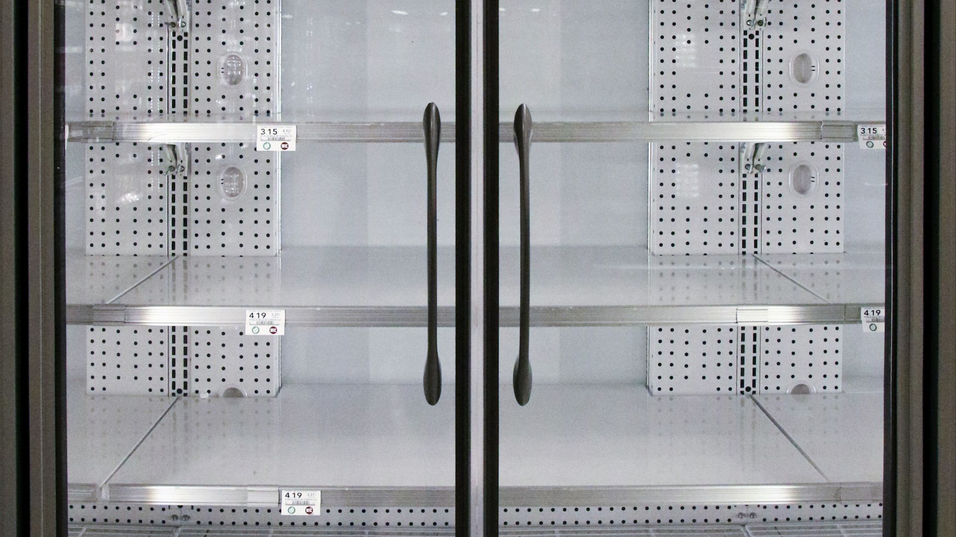 people walking on hallway inside building