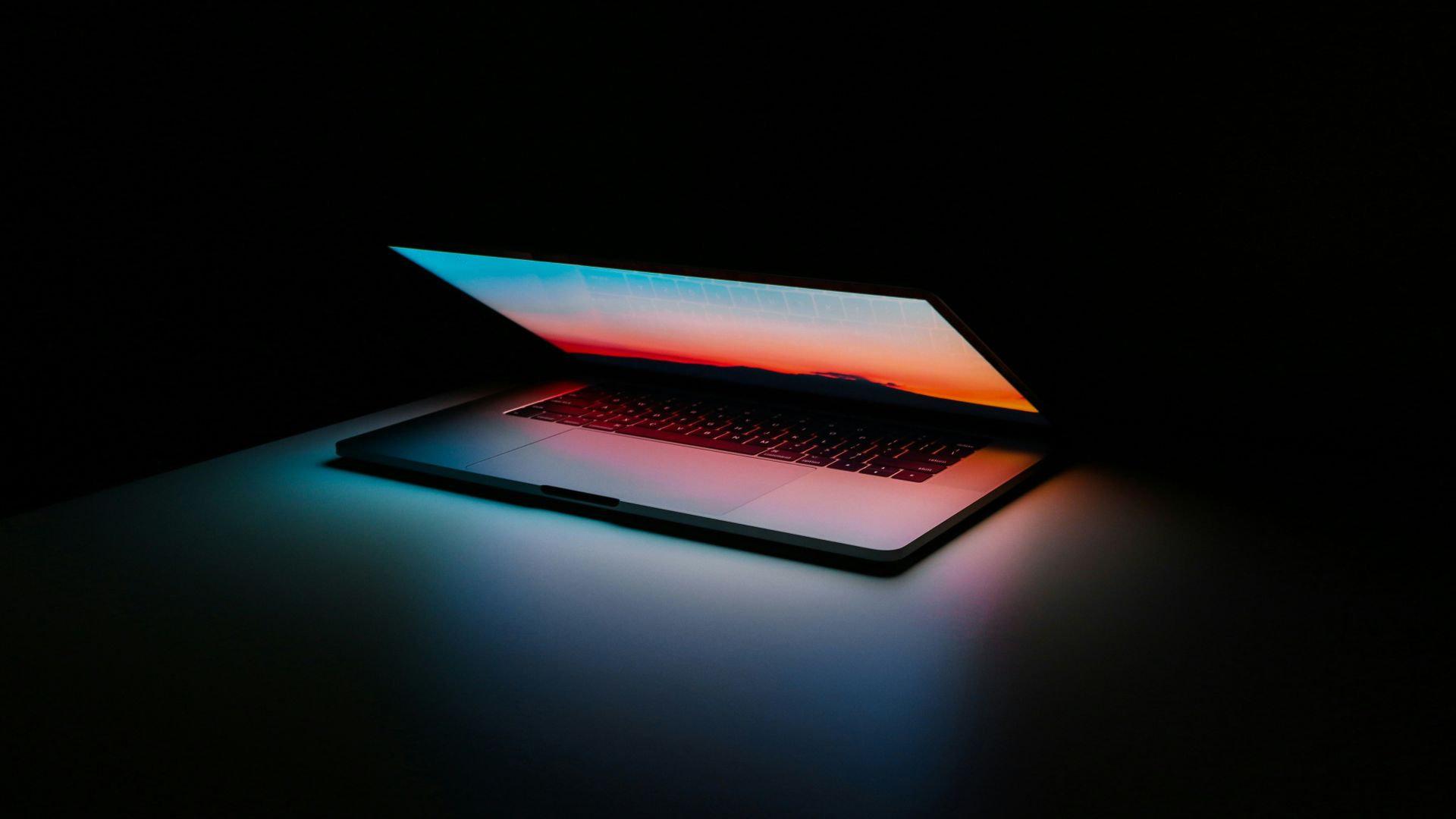 gray and black laptop computer on surface