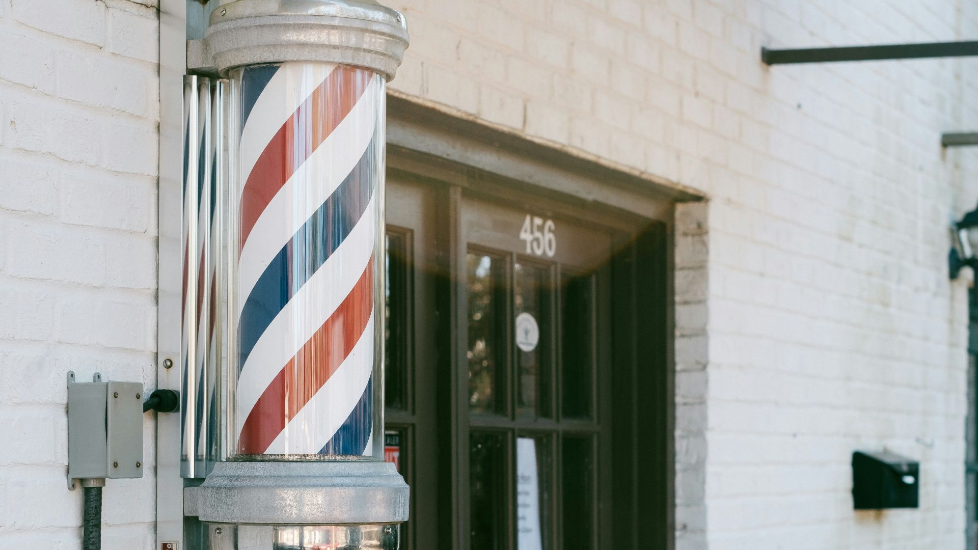 glass-panel door with brown wooden frames