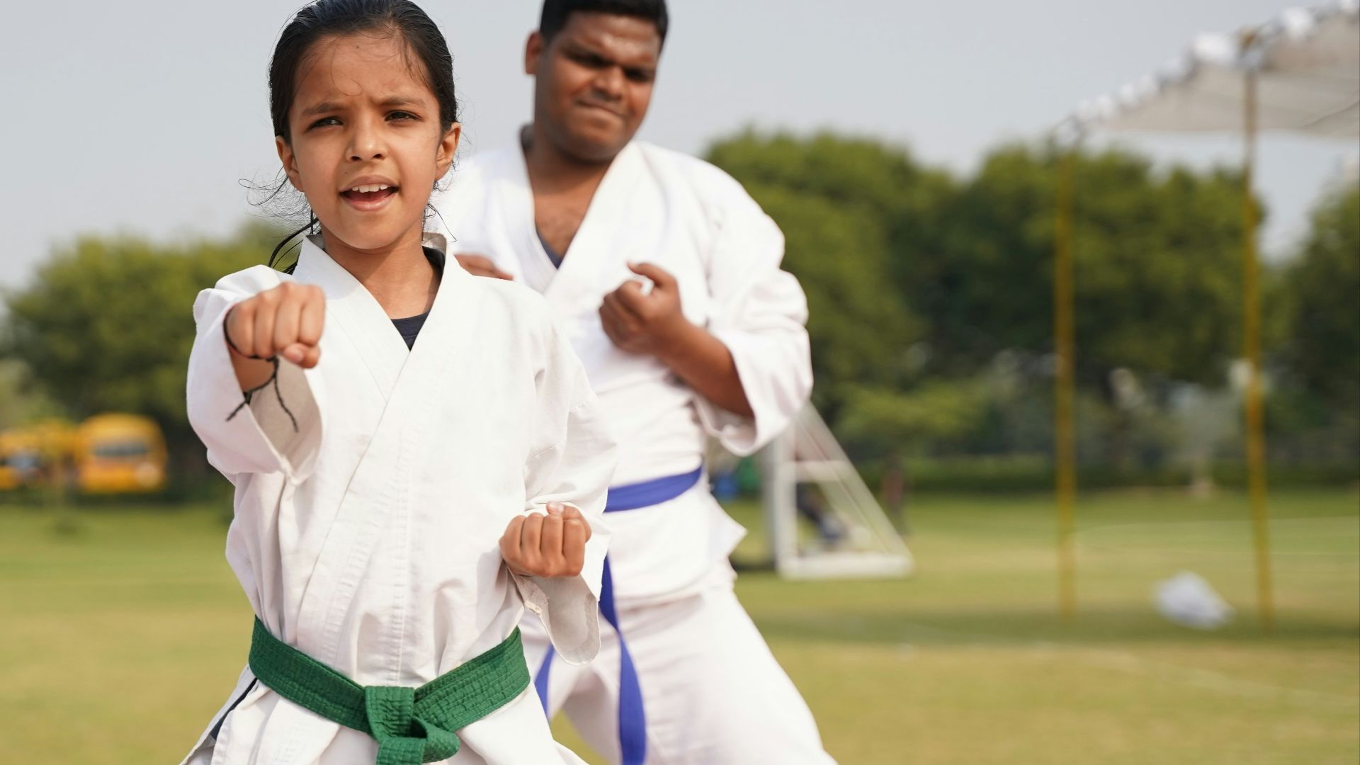 man in white button up shirt and green necktie