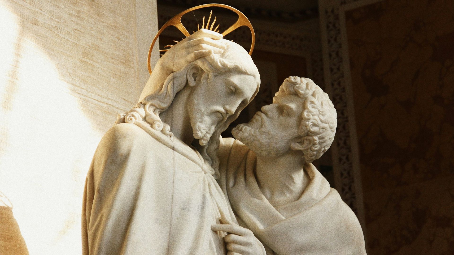 a statue of a man and a woman with a star on their head