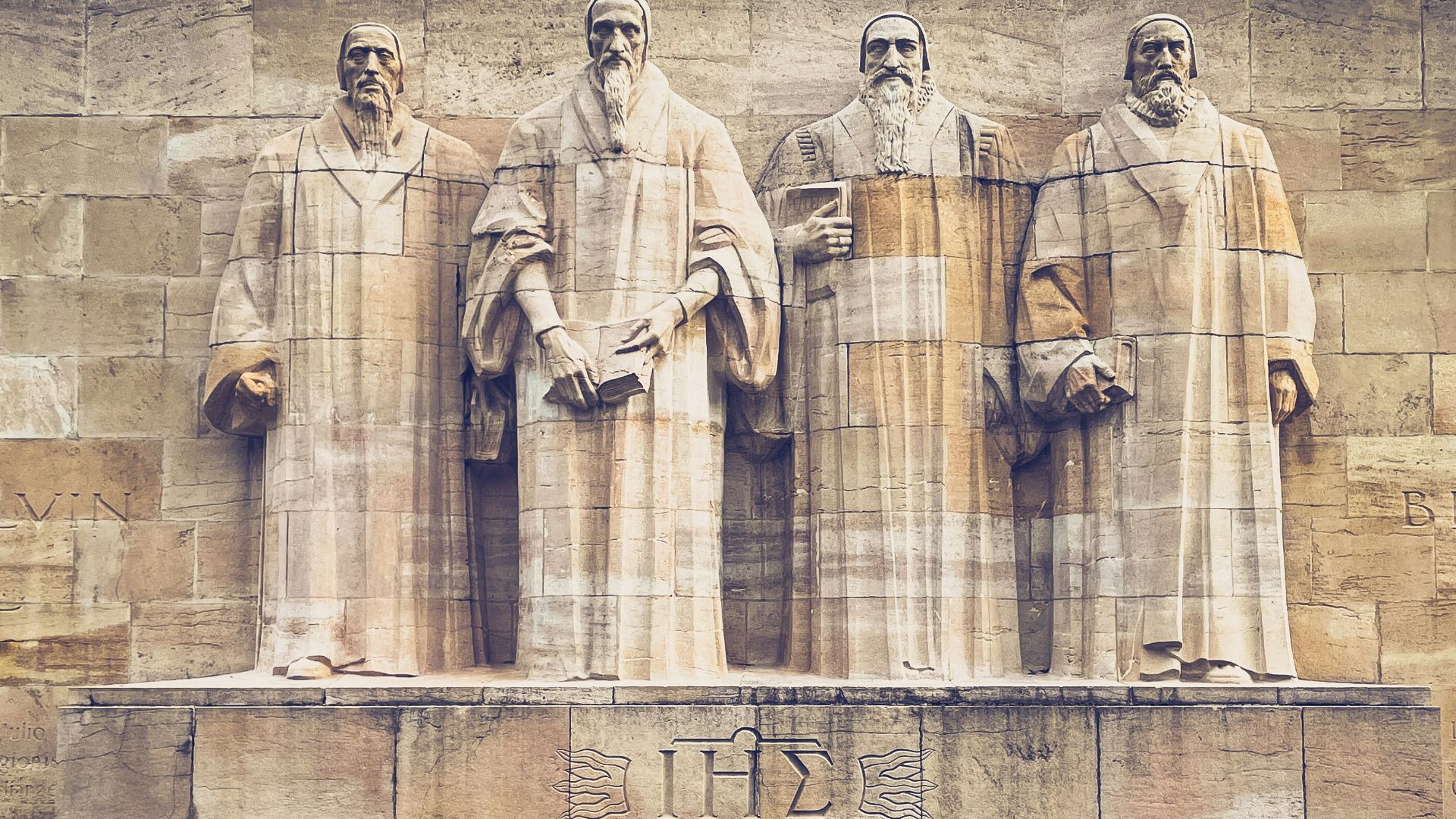 a group of statues of men standing next to each other