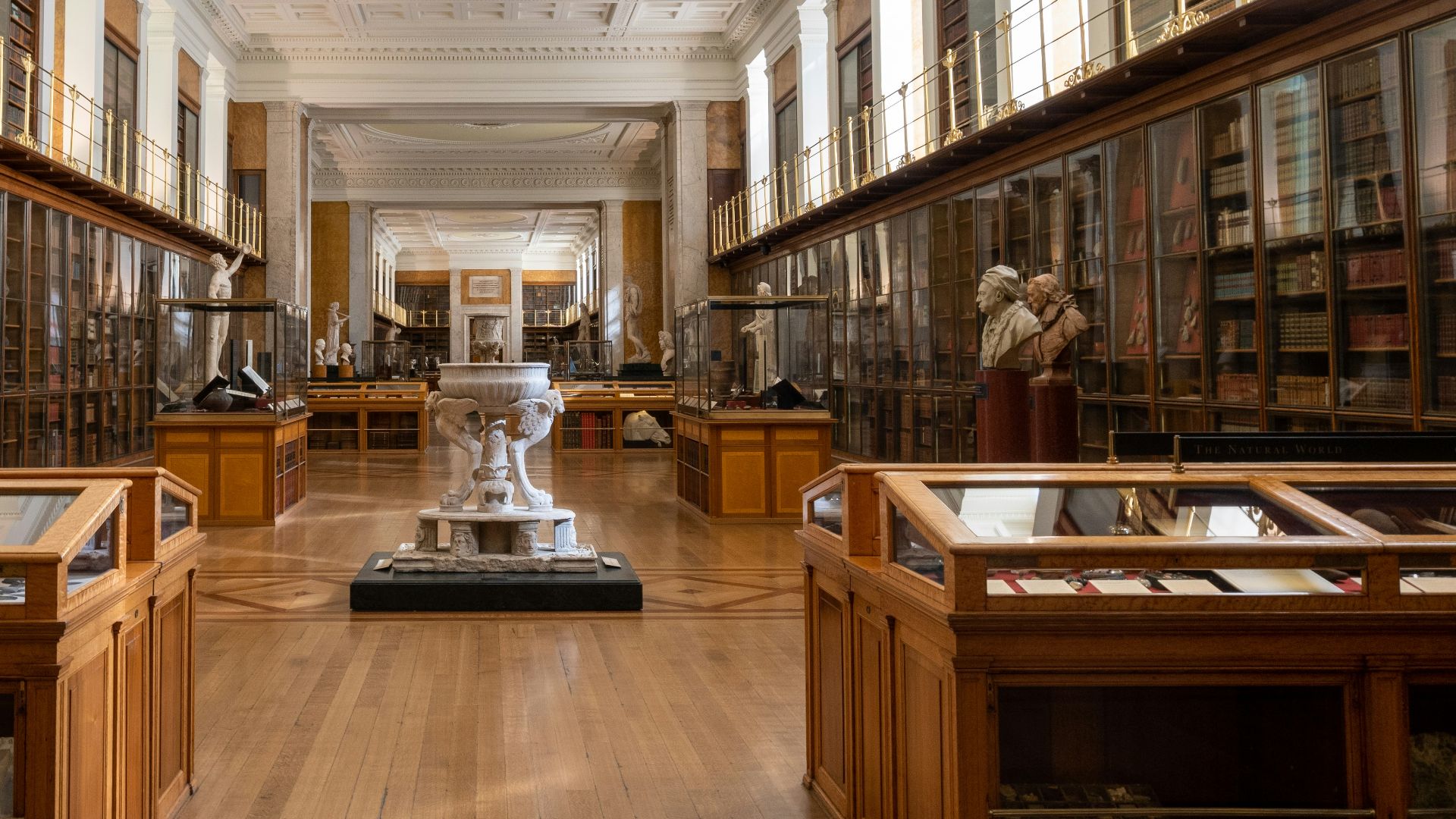 a long room filled with lots of books