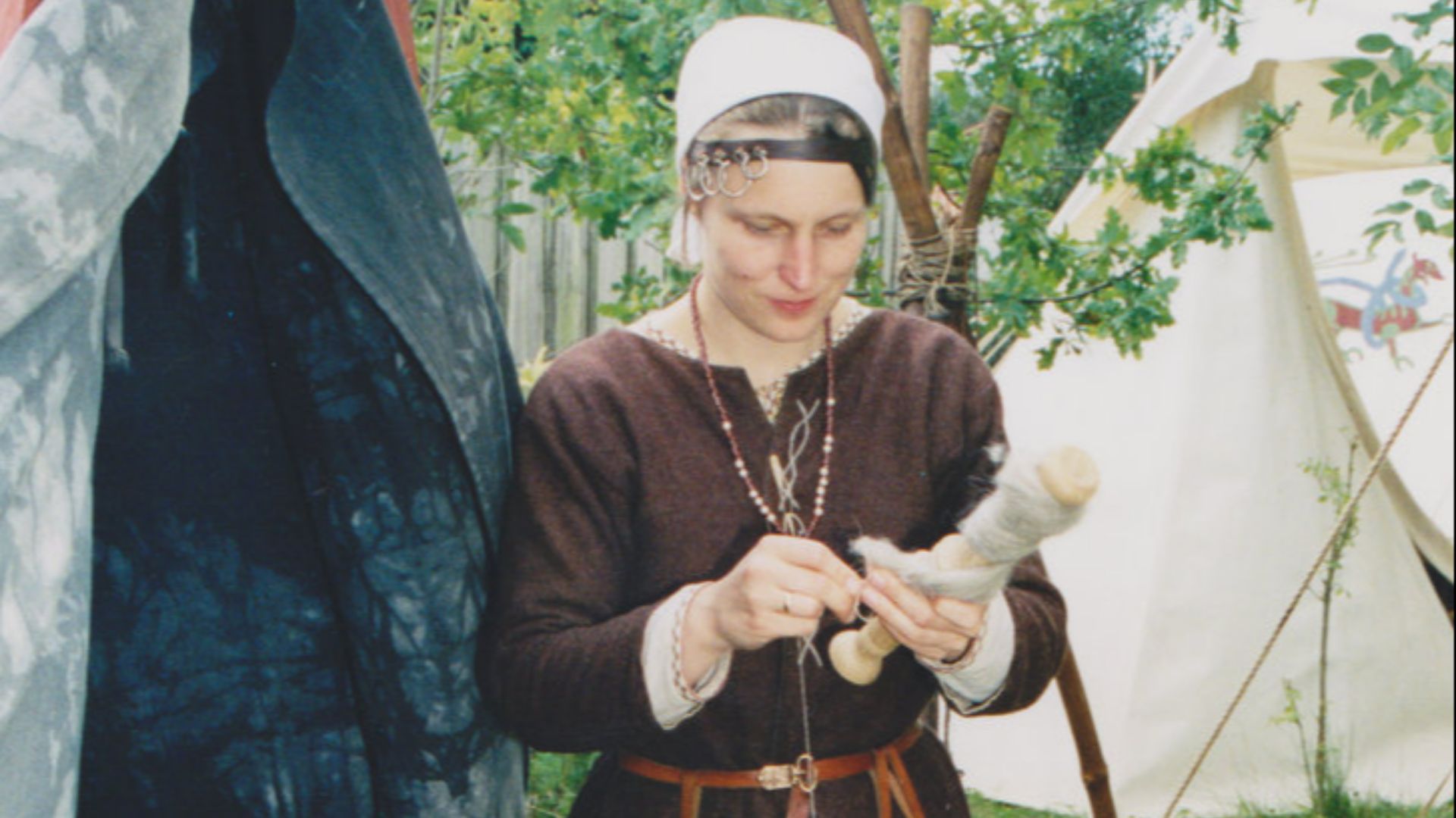 File:Viking female using the drop spindle.jpg