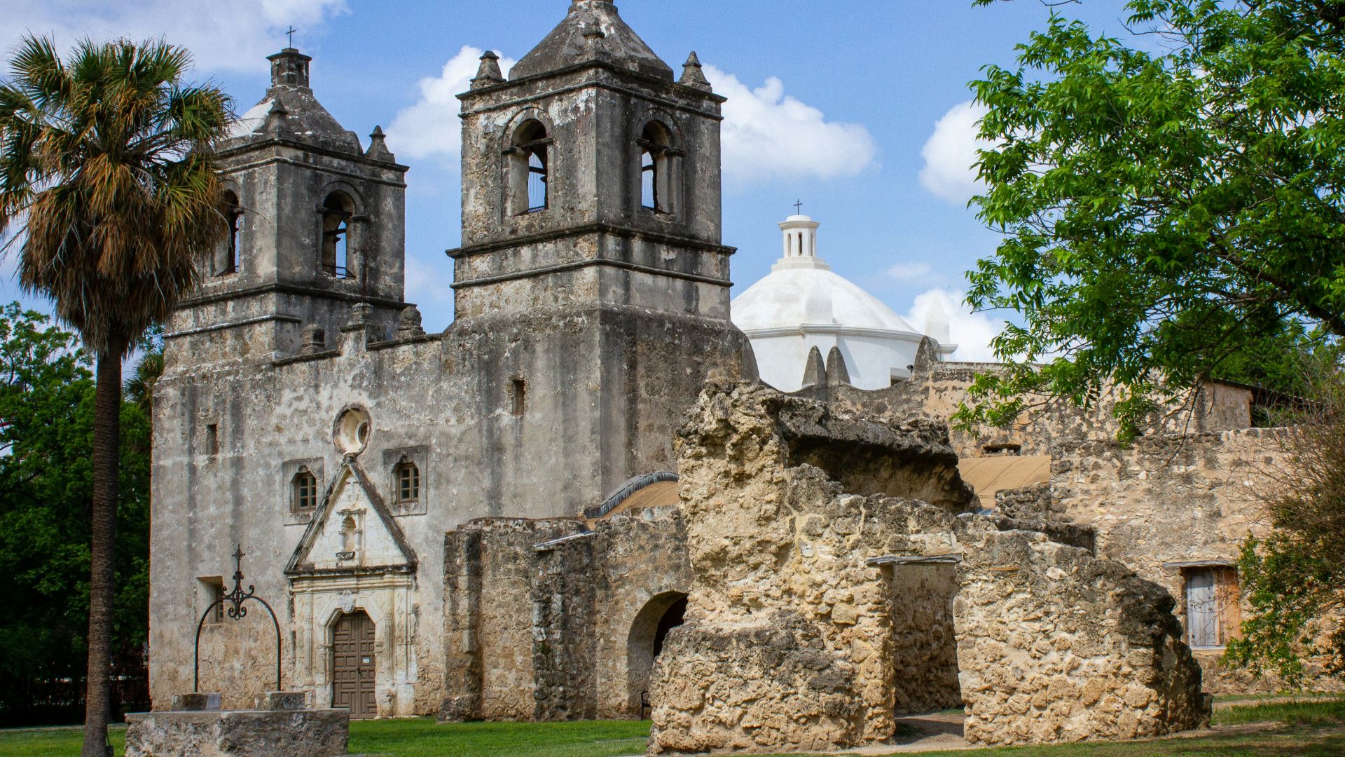 a very old building with two towers and a dome