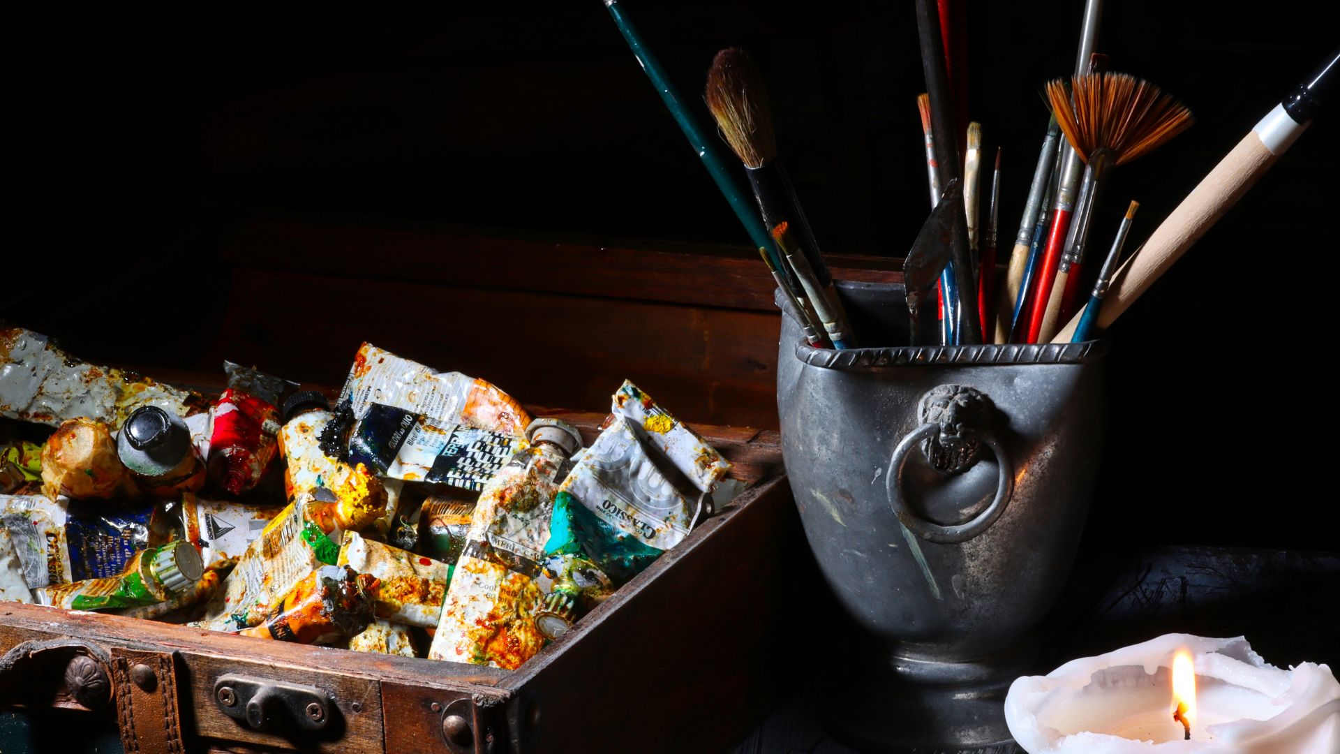 paint brushes in stainless steel bucket